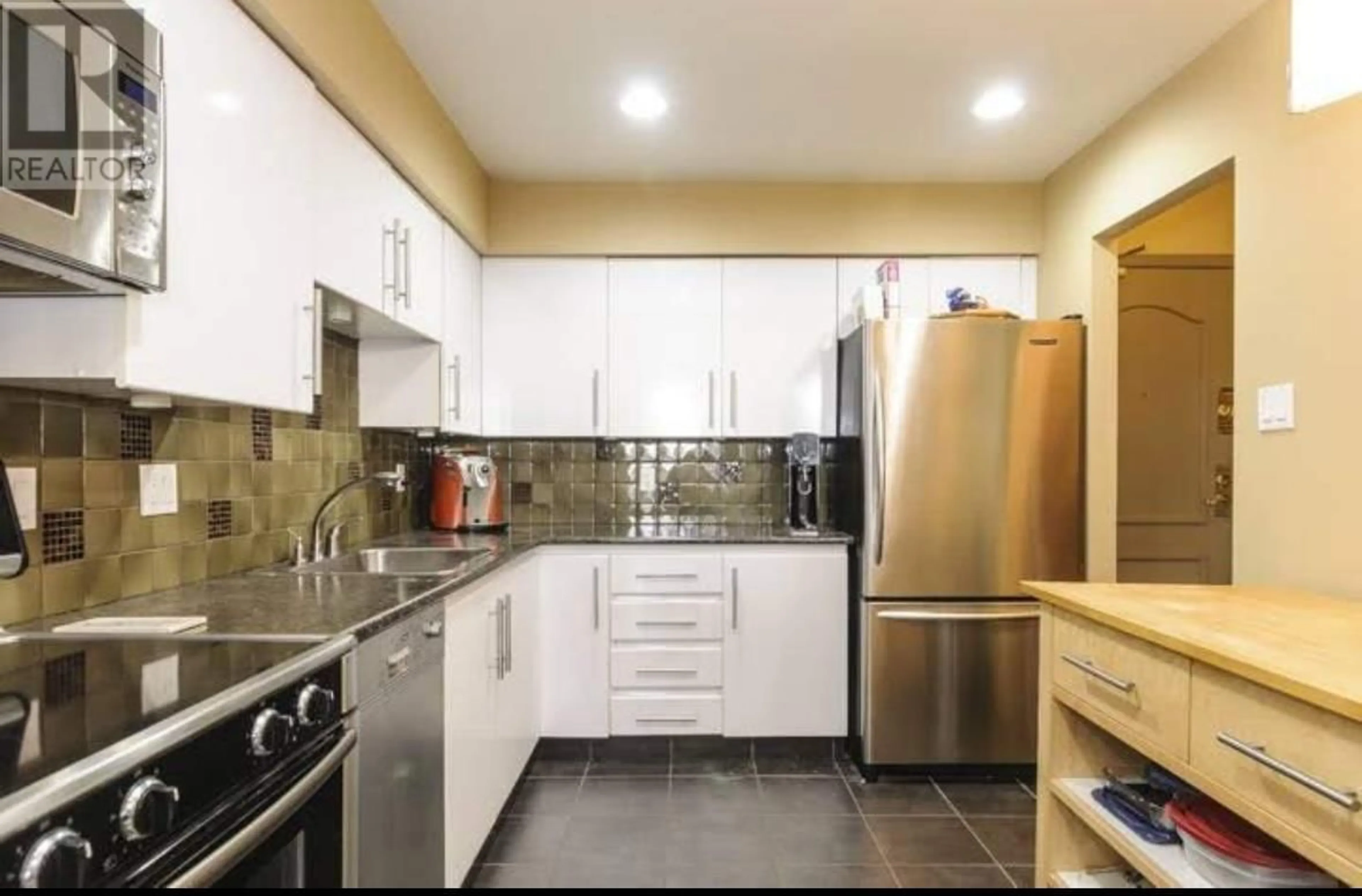 Standard kitchen, ceramic/tile floor for 402 - 6888 STATION HILL DRIVE, Burnaby British Columbia V3N4X5