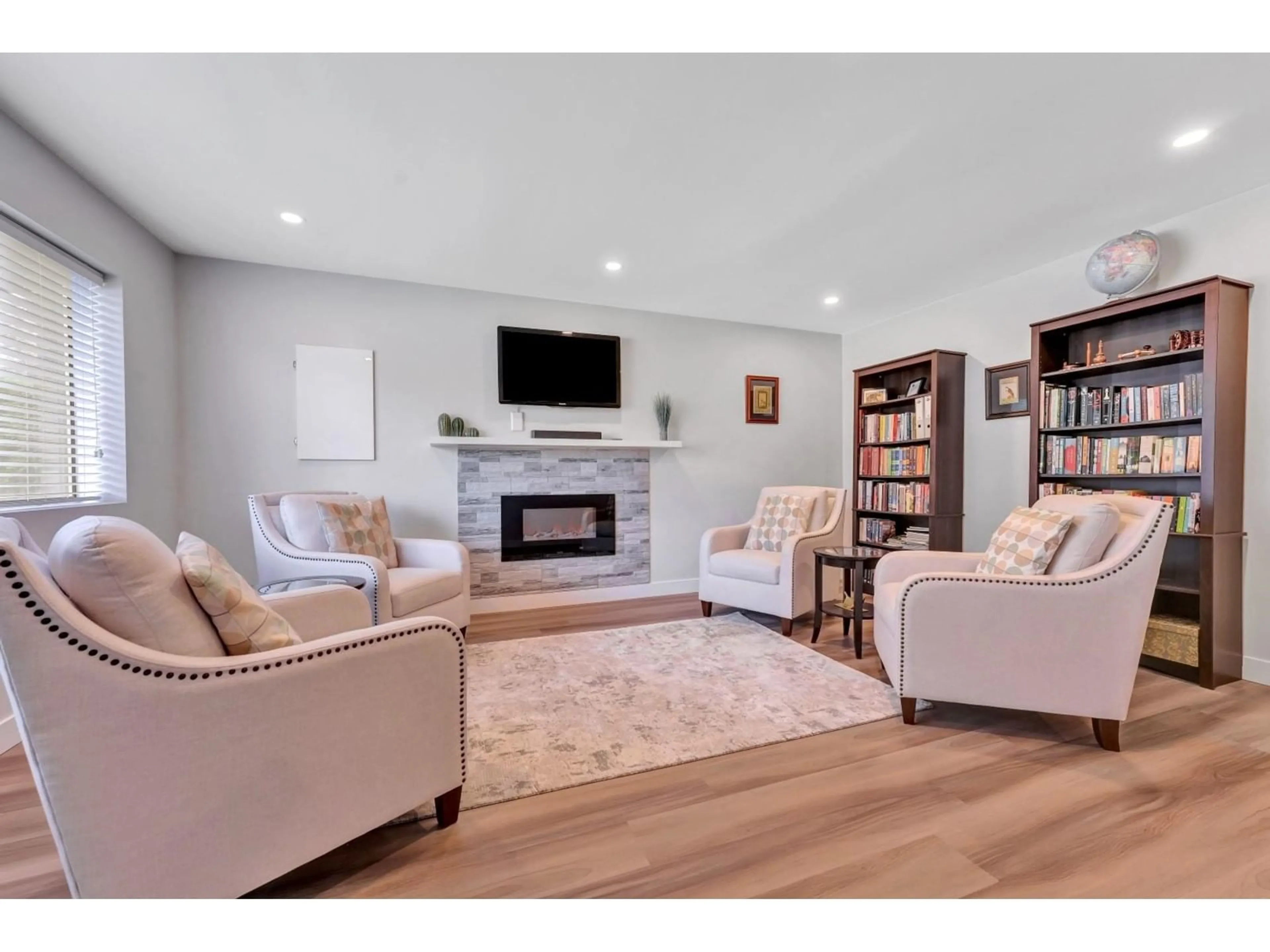 Living room with furniture, wood/laminate floor for 7614 CARNABY, Delta British Columbia V4C7X2