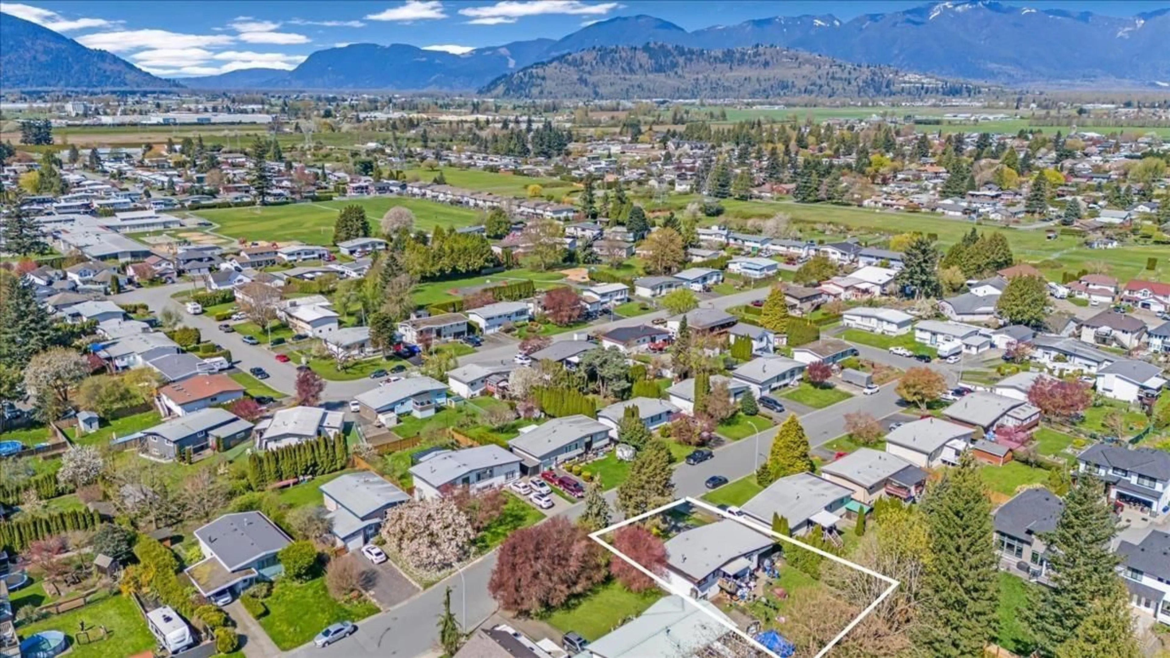 A pic from outside/outdoor area/front of a property/back of a property/a pic from drone, mountain view for 6050 GLENMORE DRIVE, Chilliwack British Columbia V2R2H5