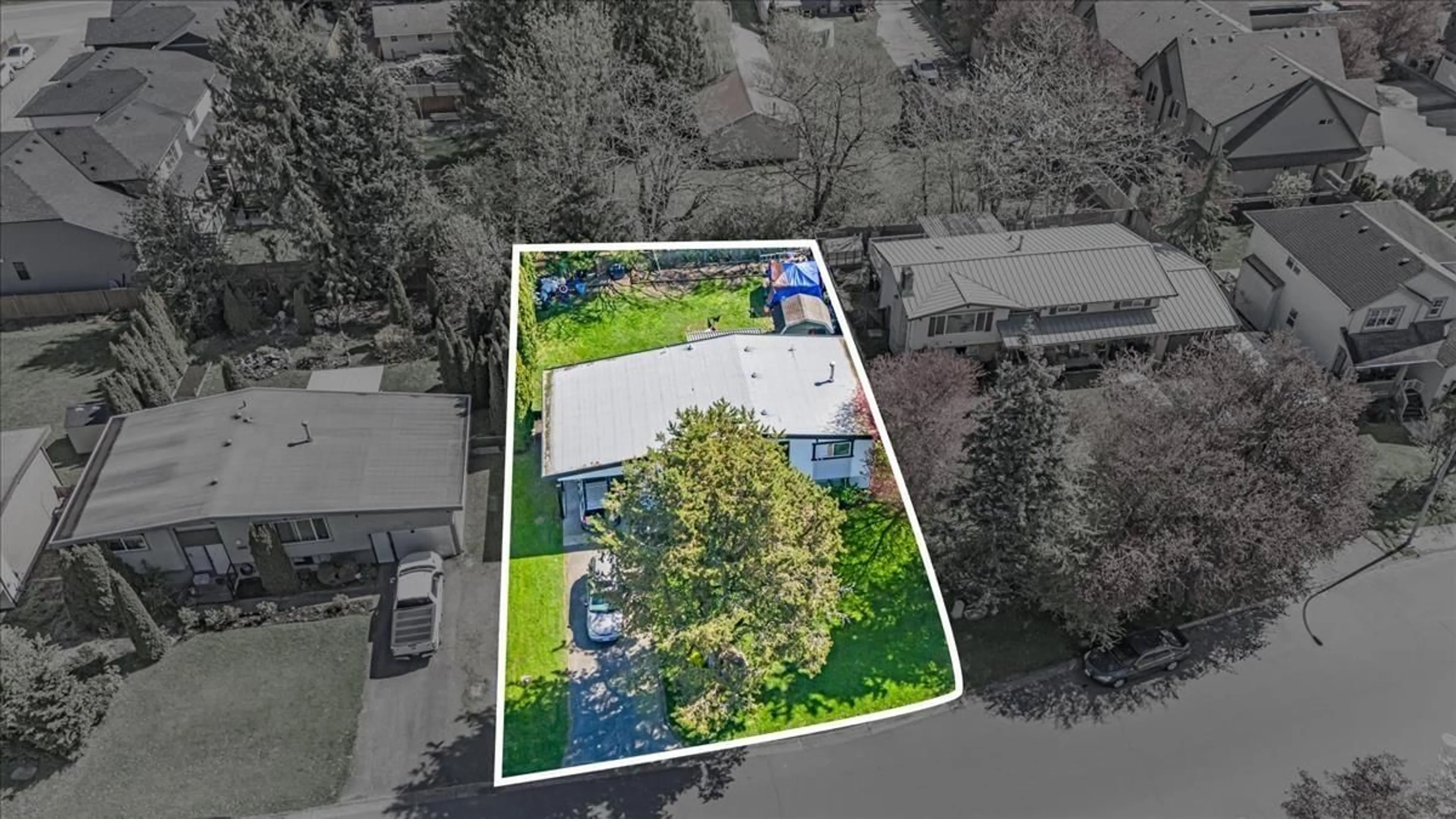 A pic from outside/outdoor area/front of a property/back of a property/a pic from drone, street for 6050 GLENMORE DRIVE, Chilliwack British Columbia V2R2H5