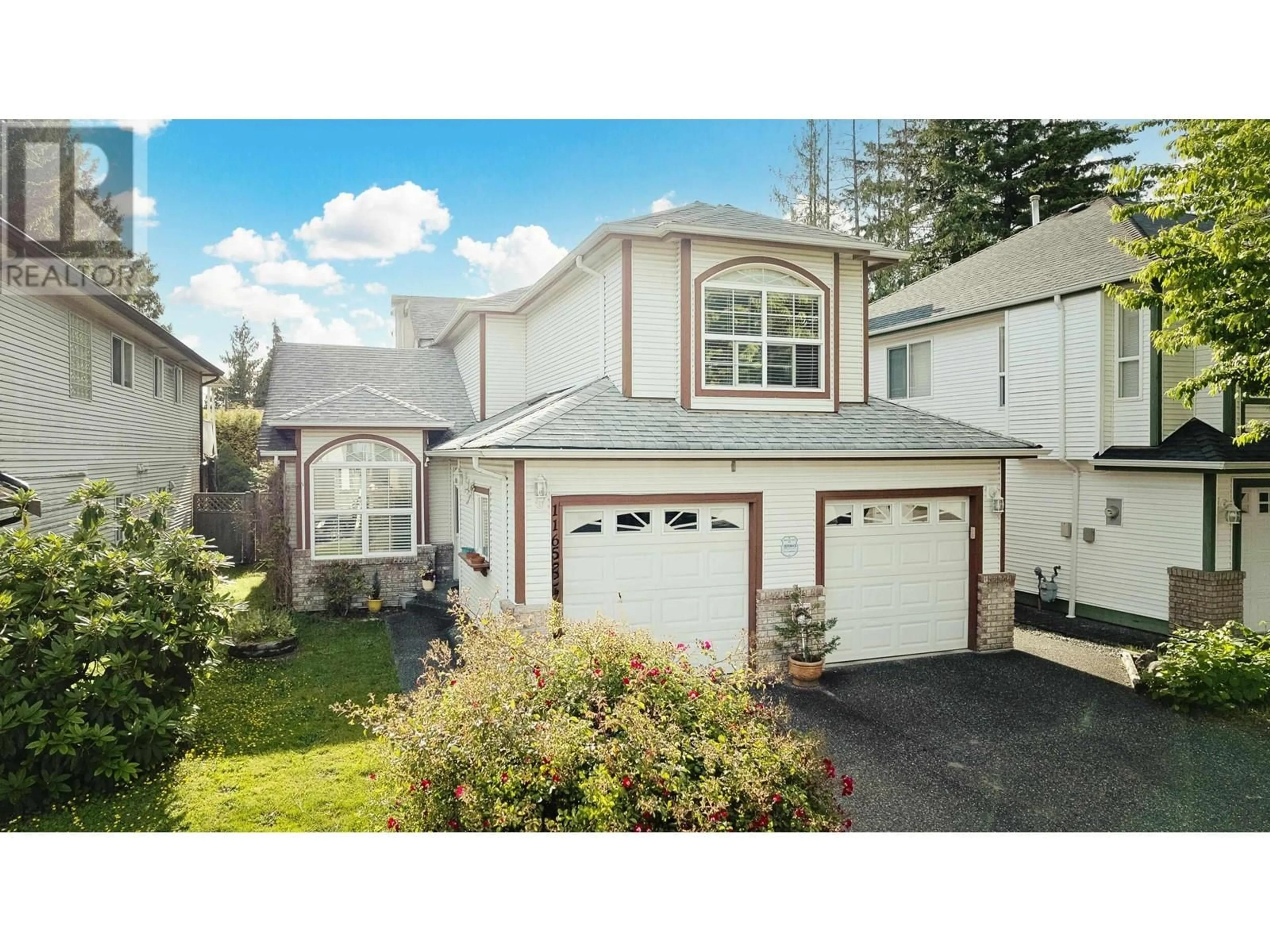 Home with vinyl exterior material, street for 11651 230B STREET, Maple Ridge British Columbia V2X1Z4
