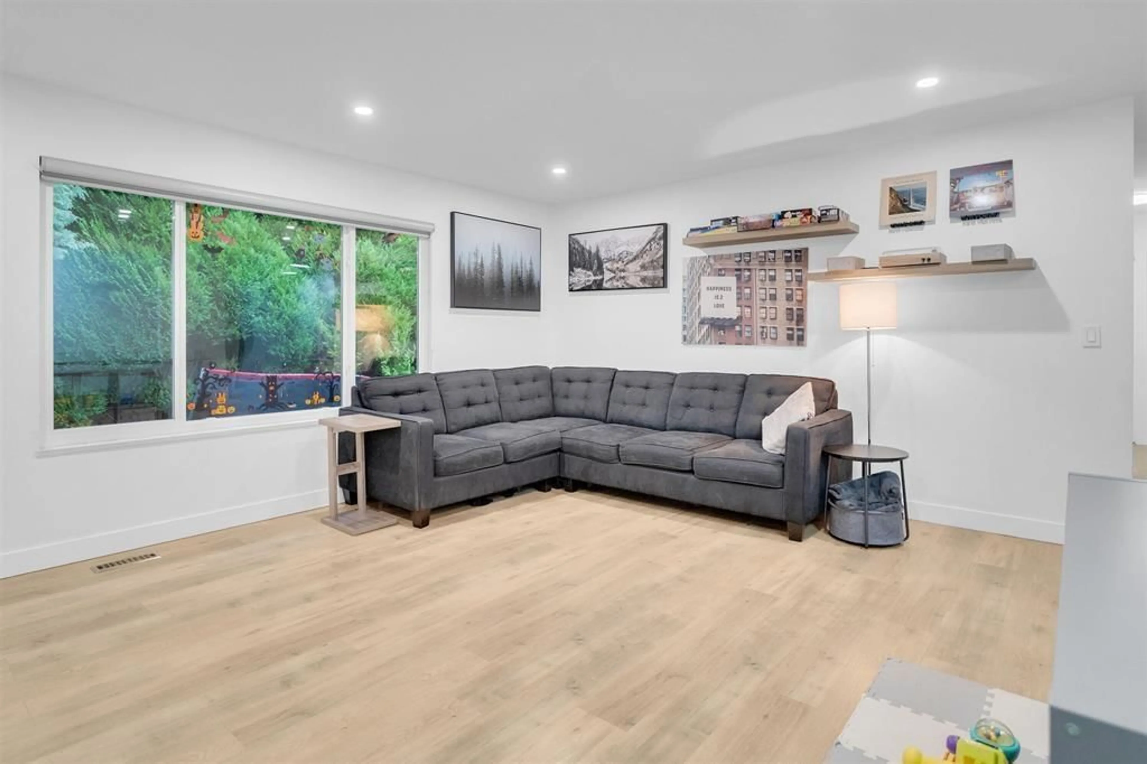 Living room with furniture, wood/laminate floor for 2042 BOWLER, Surrey British Columbia V4A6S6