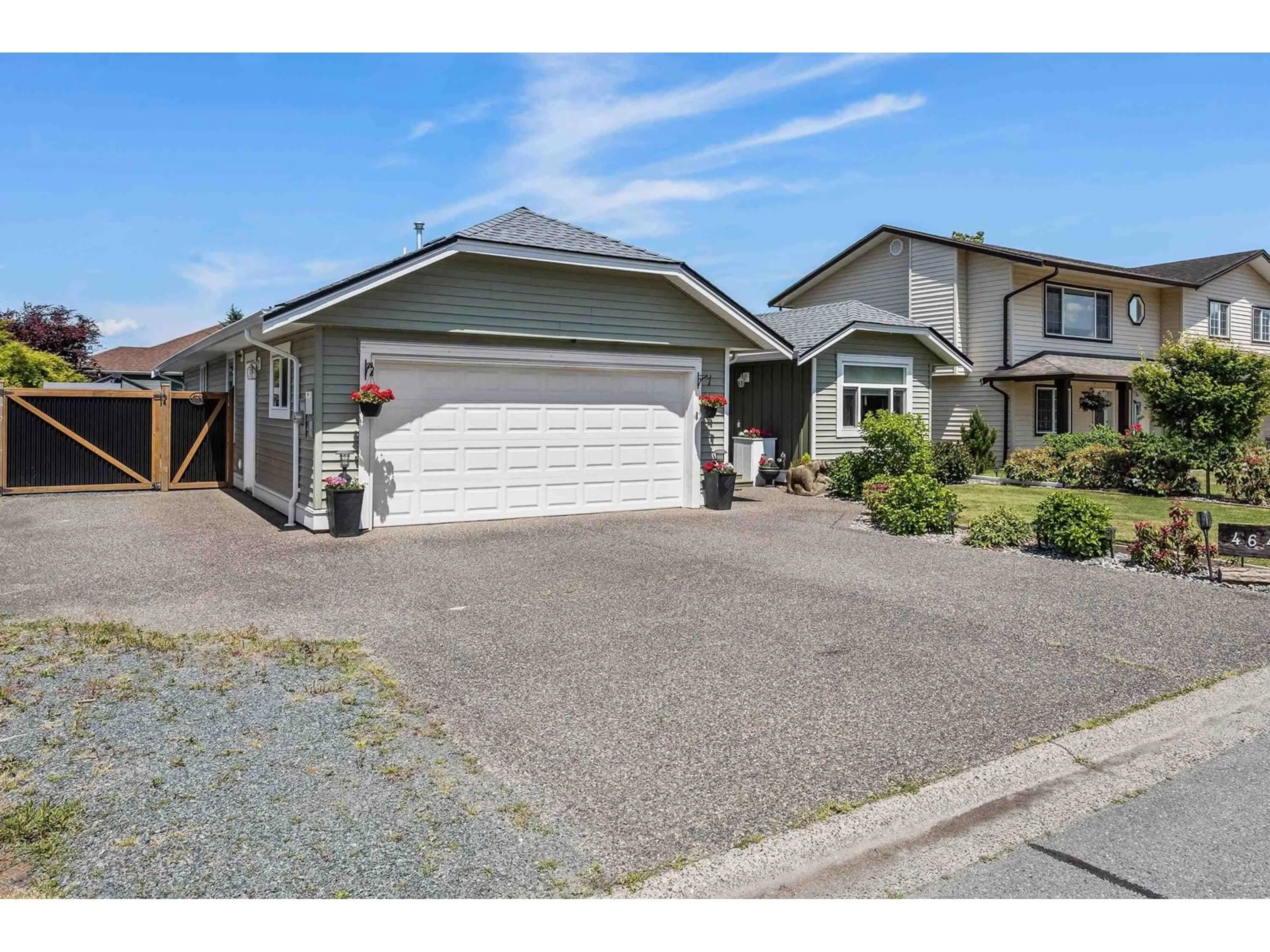 A pic from outside/outdoor area/front of a property/back of a property/a pic from drone, street for 46481 RANCHERO DRIVE, Chilliwack British Columbia V4Z1K3