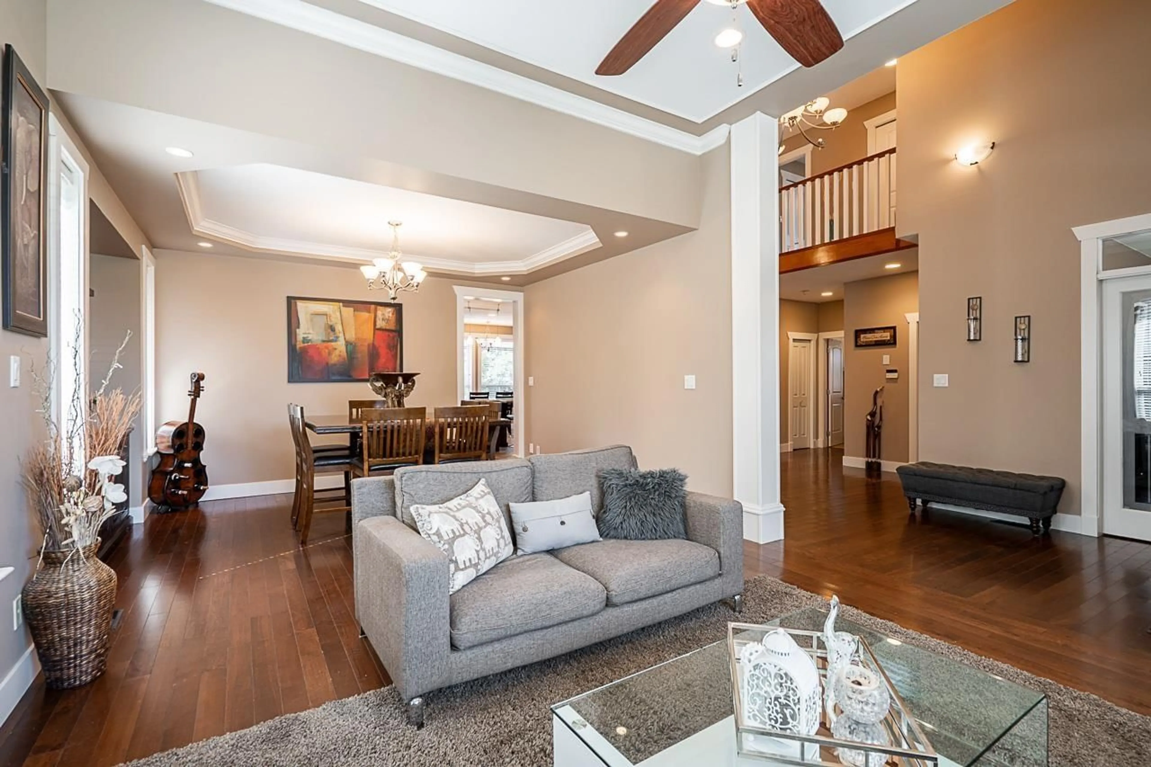 Living room with furniture, wood/laminate floor for 8741 163A, Surrey British Columbia V4N1C3