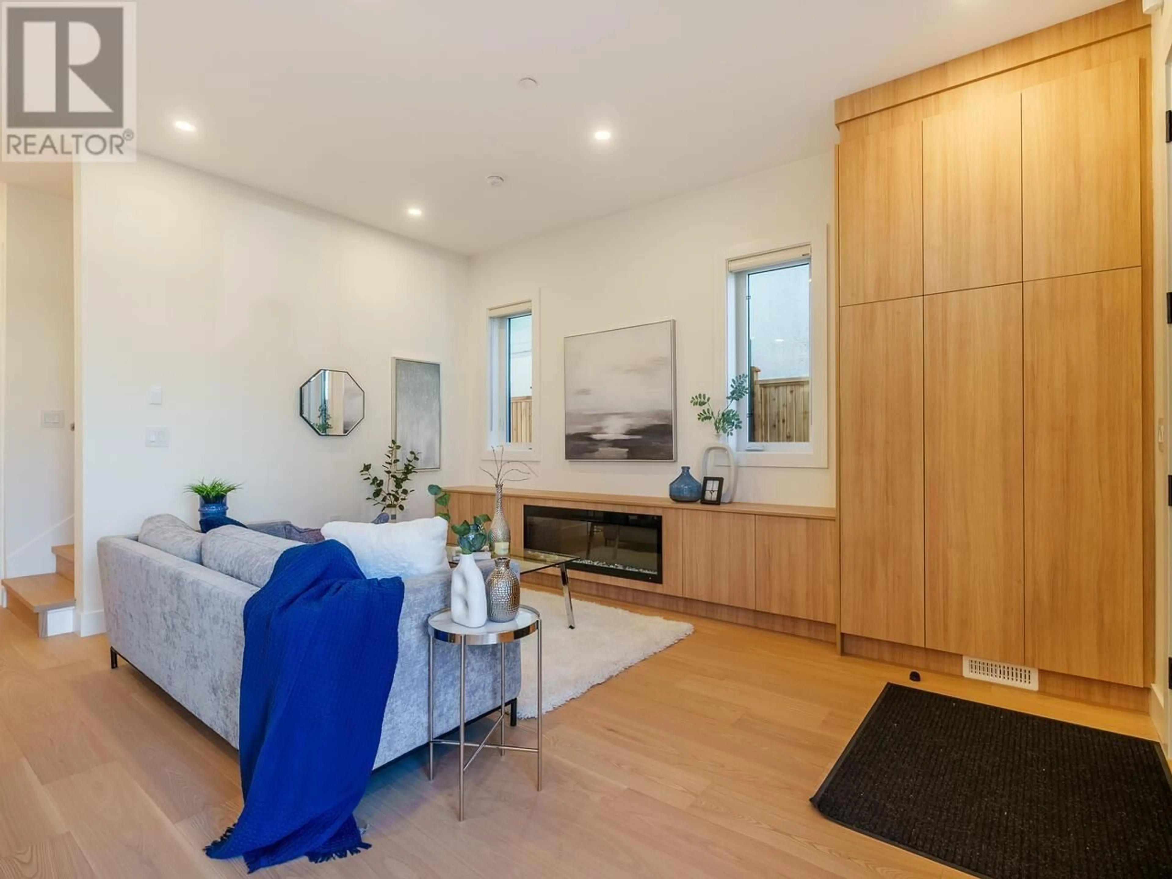 Living room with furniture, wood/laminate floor for 1 - 2248 48TH AVENUE, Vancouver British Columbia V5P1S1