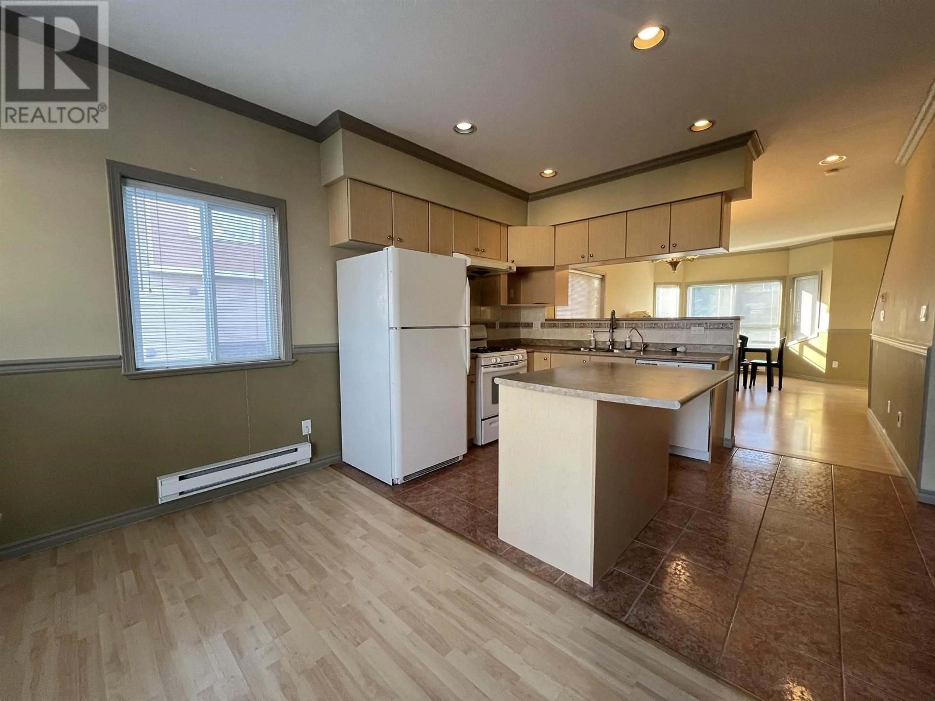Open concept kitchen, wood/laminate floor for 4 - 8080 BENNETT ROAD, Richmond British Columbia V6Y1N5