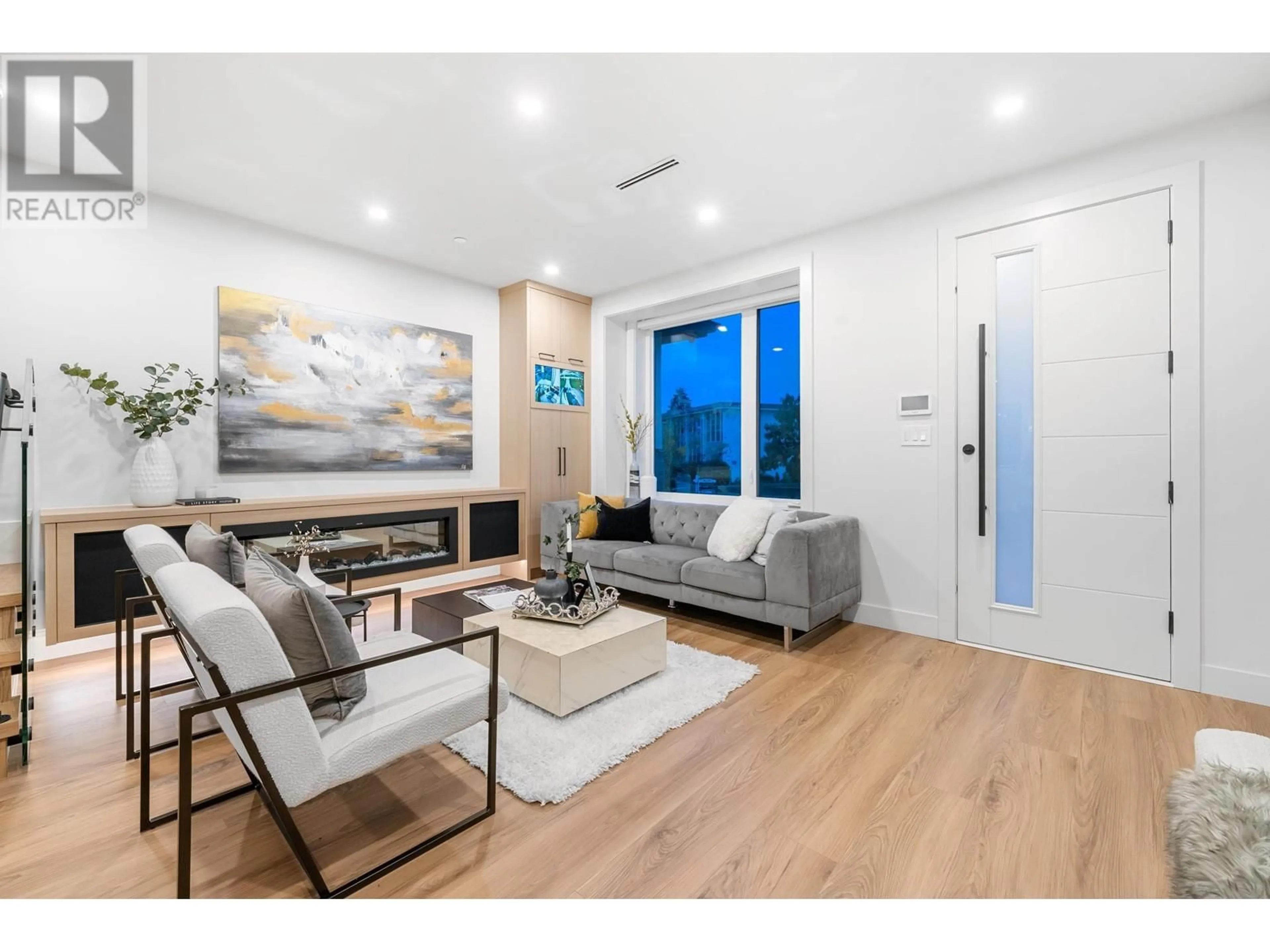 Living room with furniture, wood/laminate floor for 1810 55TH AVENUE, Vancouver British Columbia V5P2A1
