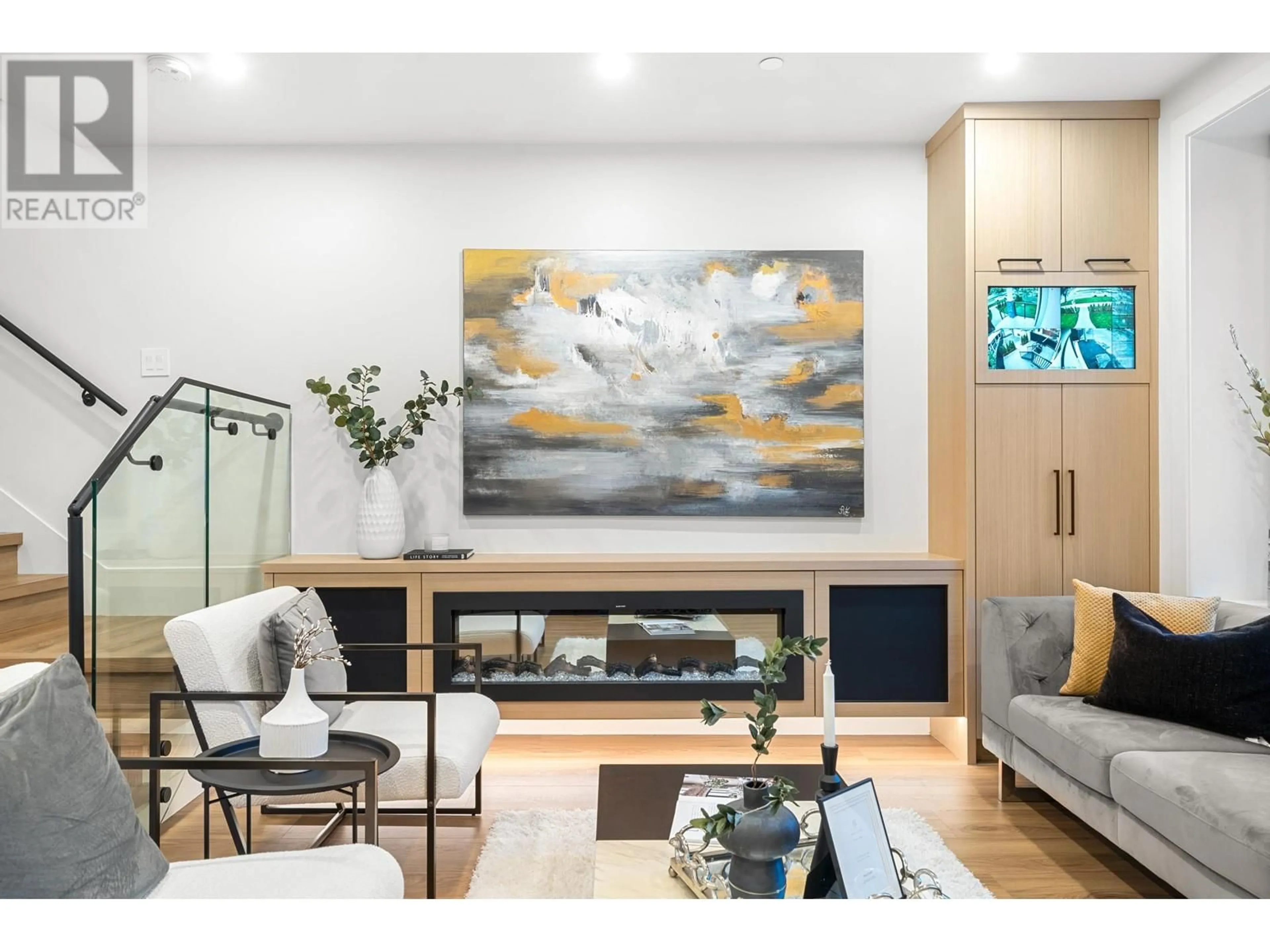 Living room with furniture, wood/laminate floor for 1810 55TH AVENUE, Vancouver British Columbia V5P2A1