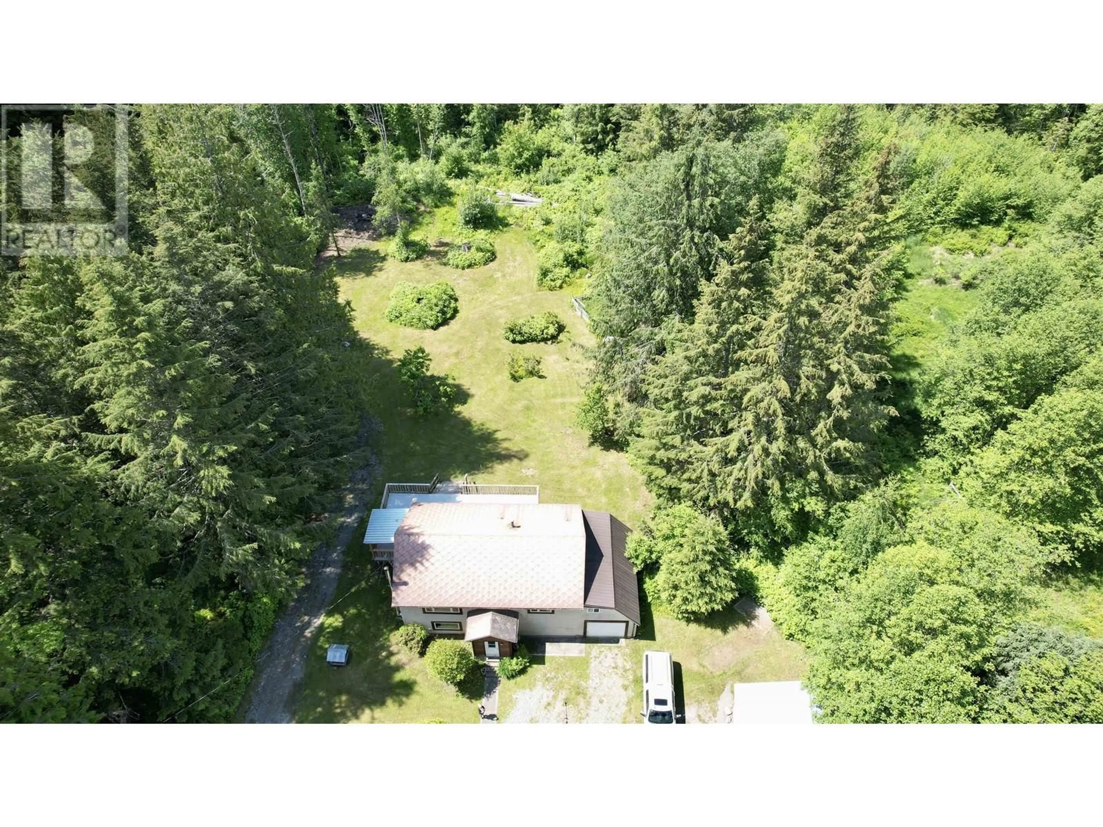 A pic from outside/outdoor area/front of a property/back of a property/a pic from drone, forest/trees view for 2288 SALOOMPT ROAD, Bella Coola British Columbia V0T1H0