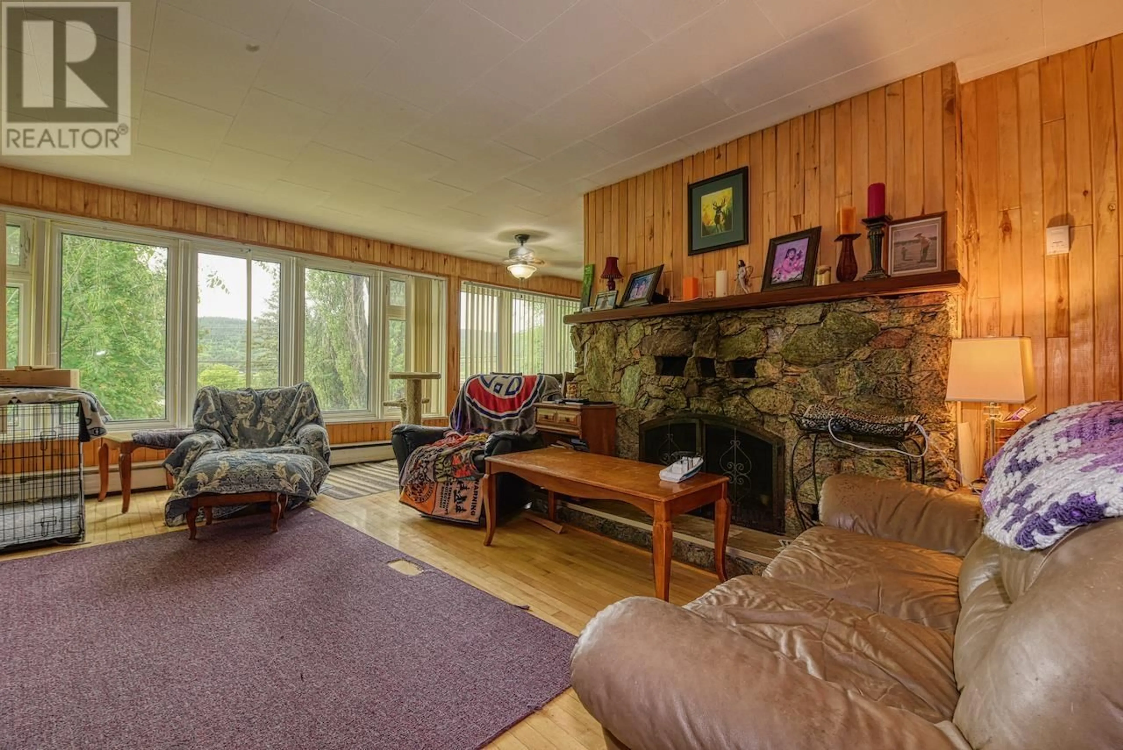 Living room with furniture, wood/laminate floor for 1510 BROADWAY AVENUE, Williams Lake British Columbia V2G3T6