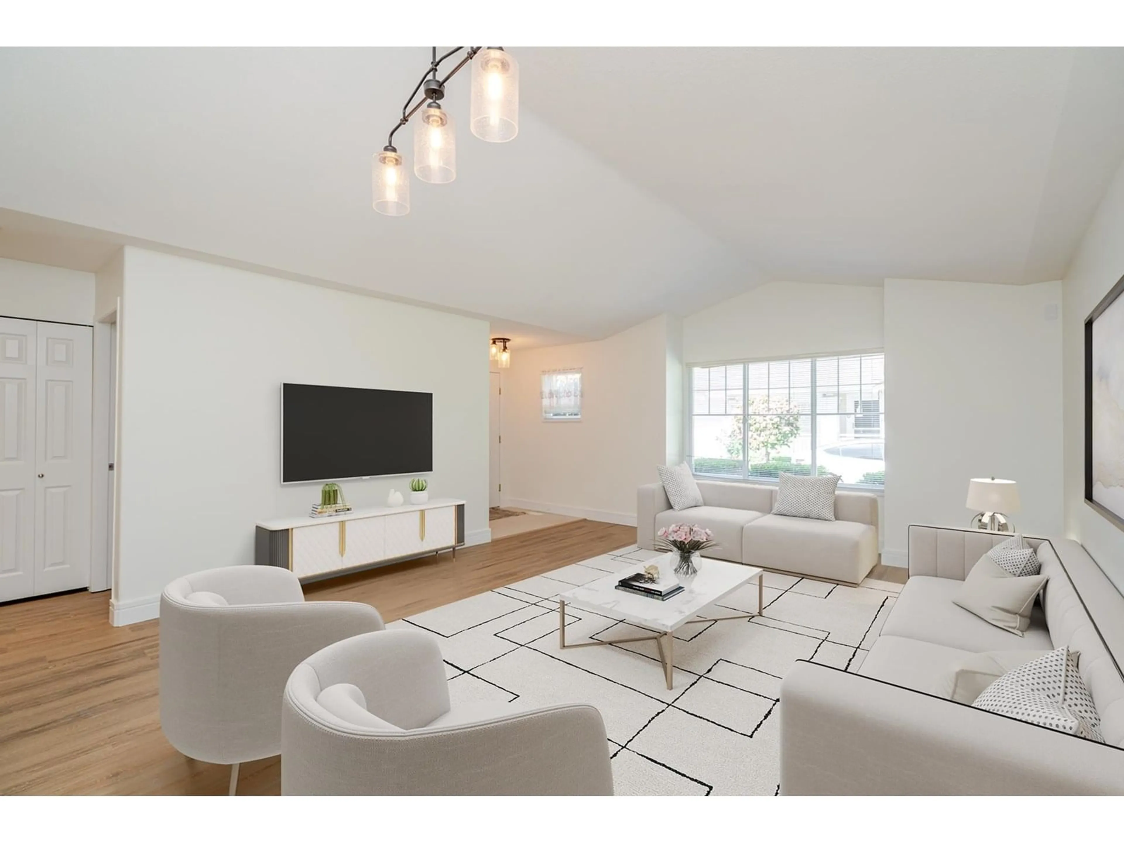 Living room with furniture, wood/laminate floor for 54 - 6885 184, Surrey British Columbia V3S9G1