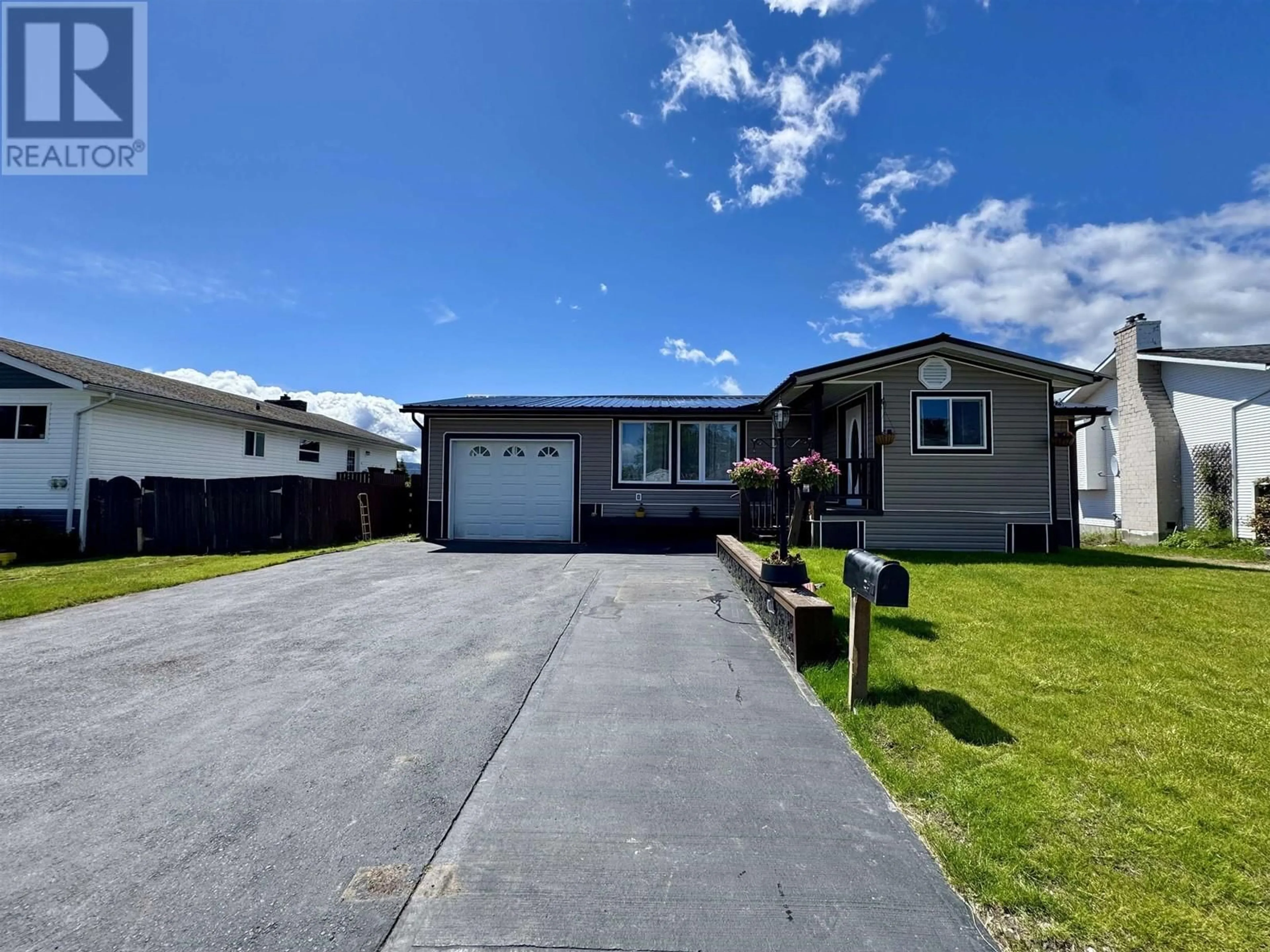 Home with vinyl exterior material, street for 107 CARLSON STREET, Kitimat British Columbia V8C1A9