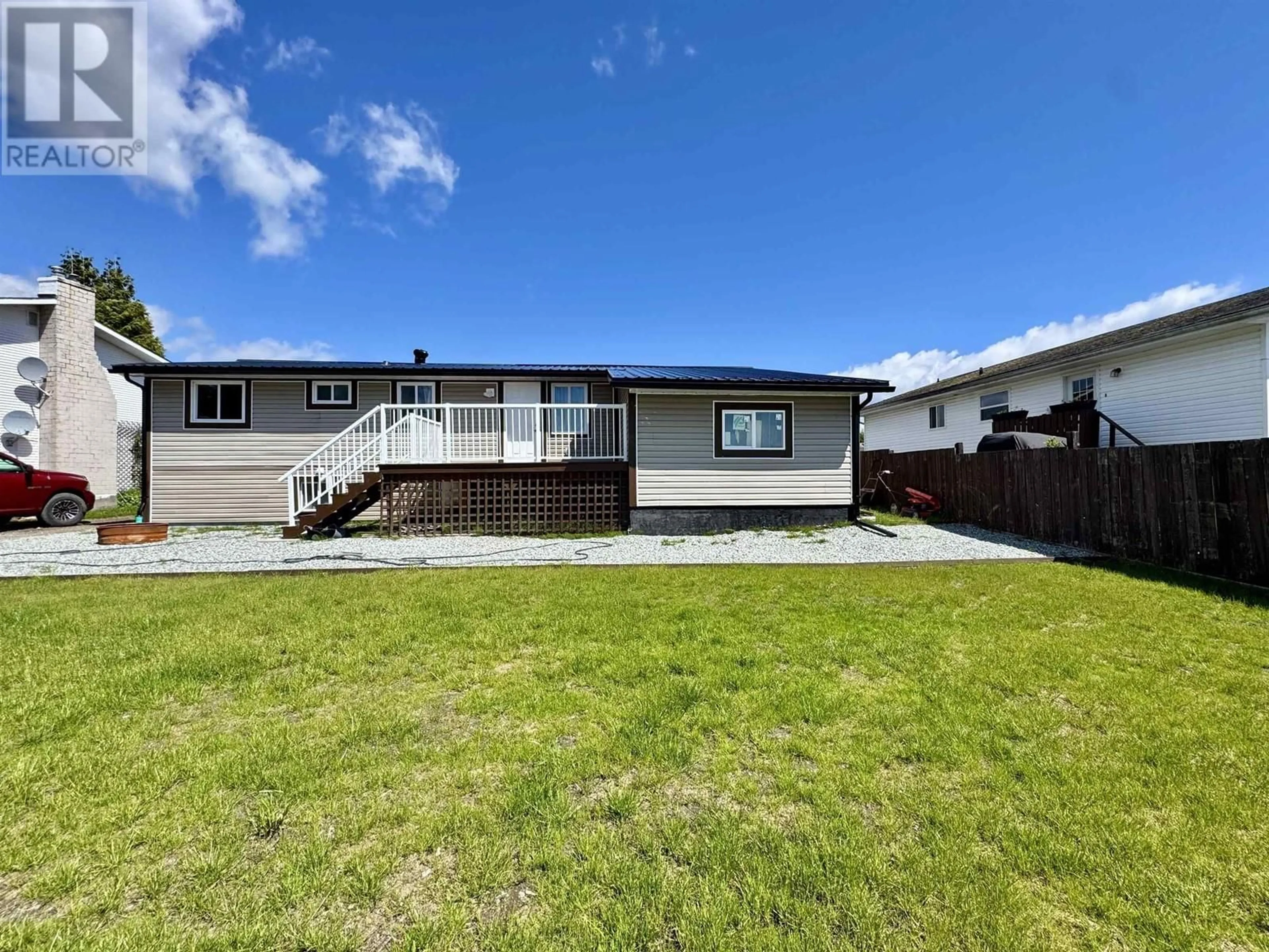 A pic from outside/outdoor area/front of a property/back of a property/a pic from drone, unknown for 107 CARLSON STREET, Kitimat British Columbia V8C1A9
