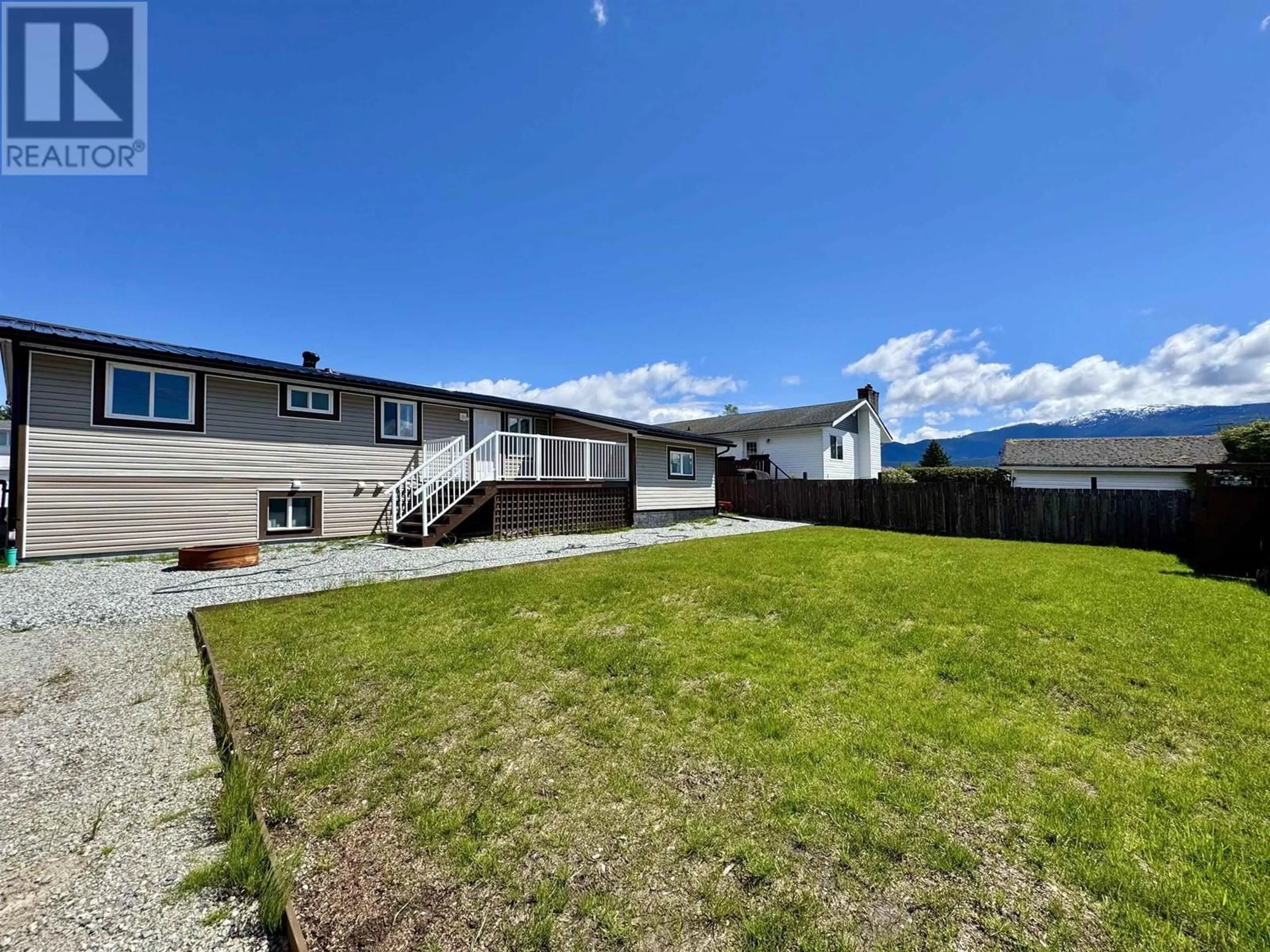 A pic from outside/outdoor area/front of a property/back of a property/a pic from drone, unknown for 107 CARLSON STREET, Kitimat British Columbia V8C1A9