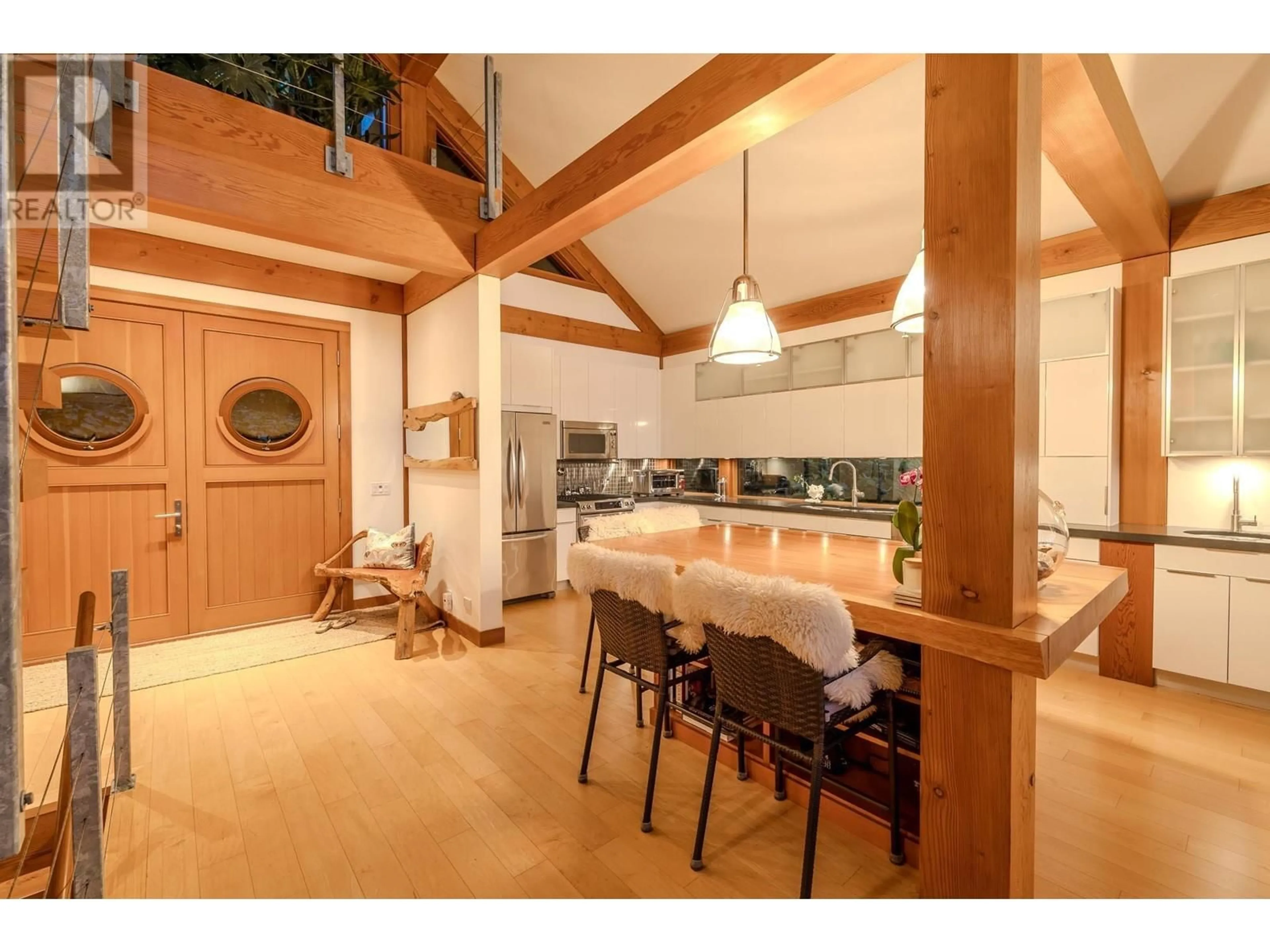 Open concept kitchen, wood/laminate floor for 4865 SUNSHINE COAST HIGHWAY, Sechelt British Columbia V7Z0B6