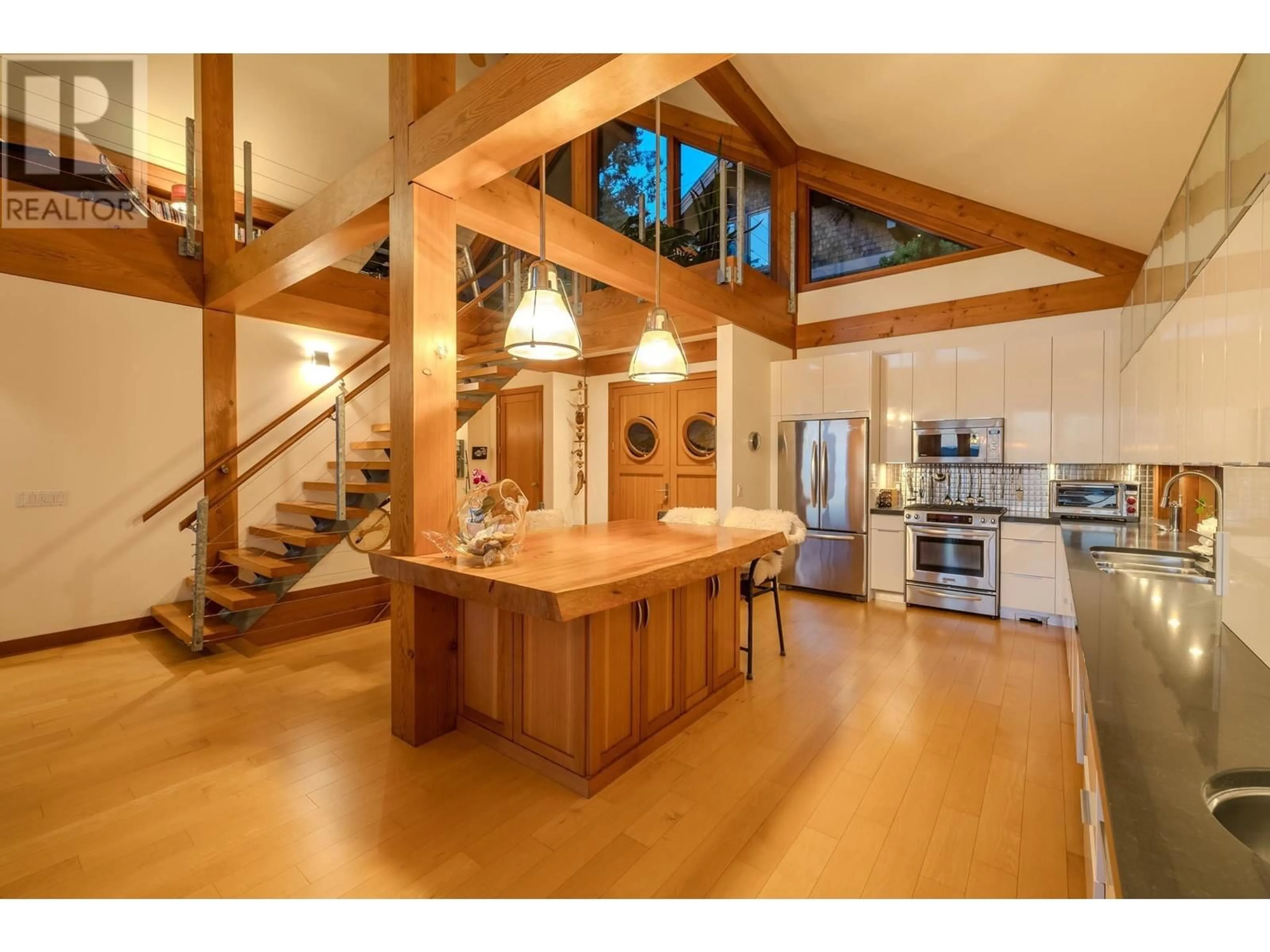 Open concept kitchen, wood/laminate floor for 4865 SUNSHINE COAST HIGHWAY, Sechelt British Columbia V7Z0B6