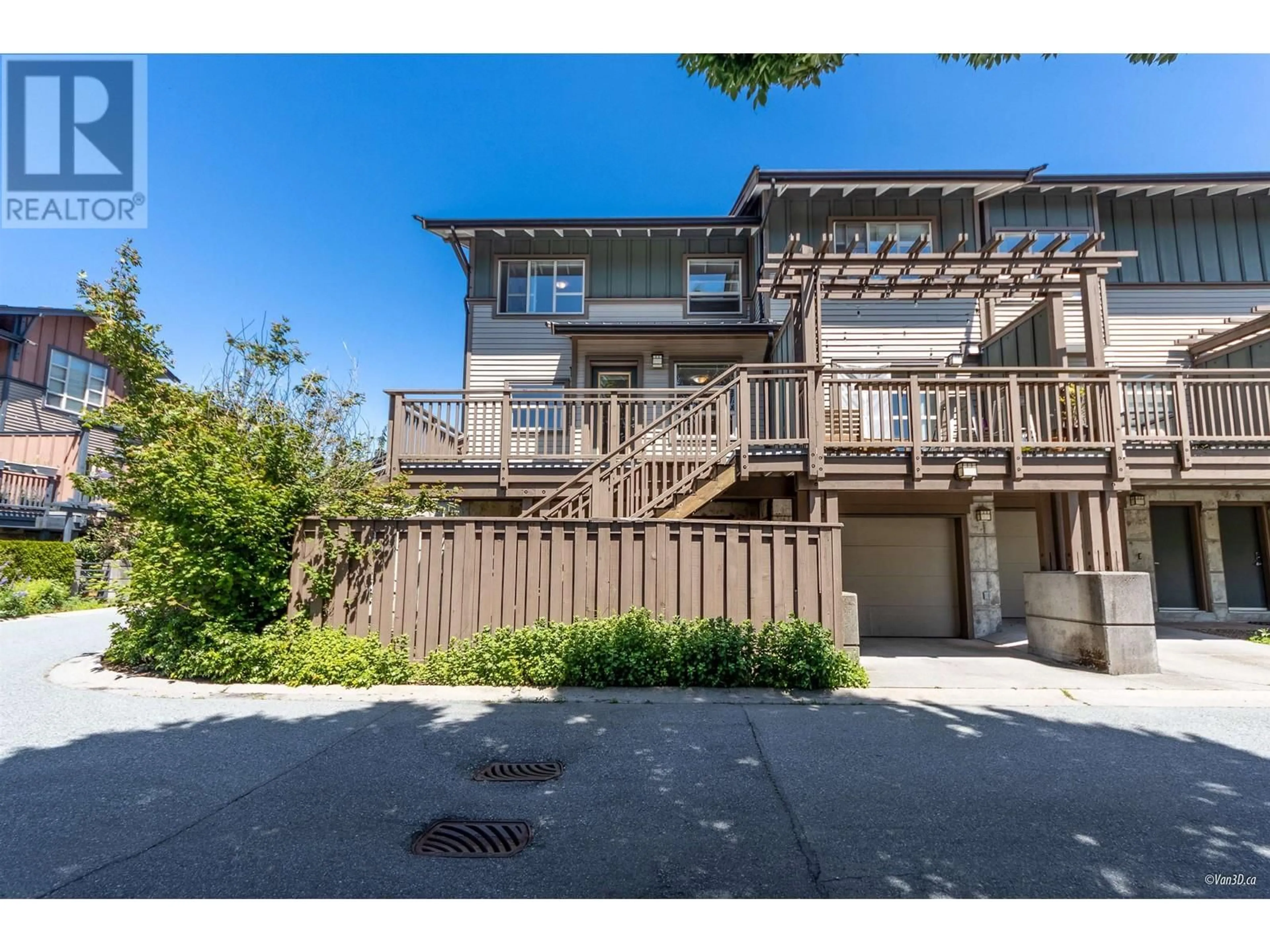 A pic from outside/outdoor area/front of a property/back of a property/a pic from drone, street for 1190 VILLAGE GREEN WAY, Squamish British Columbia V8B0N5
