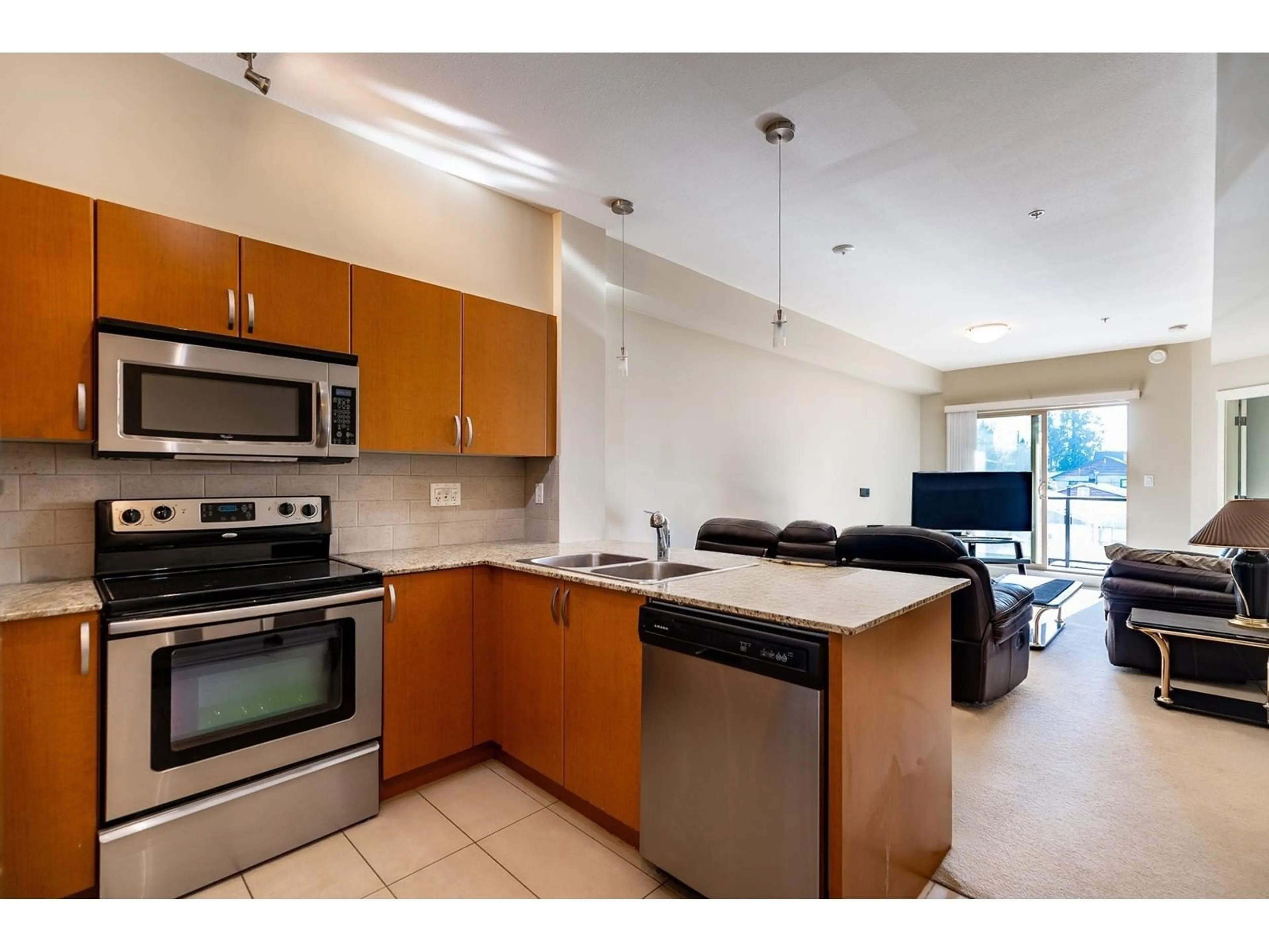 Open concept kitchen, unknown for 323 - 13789 107A, Surrey British Columbia V3T0B8