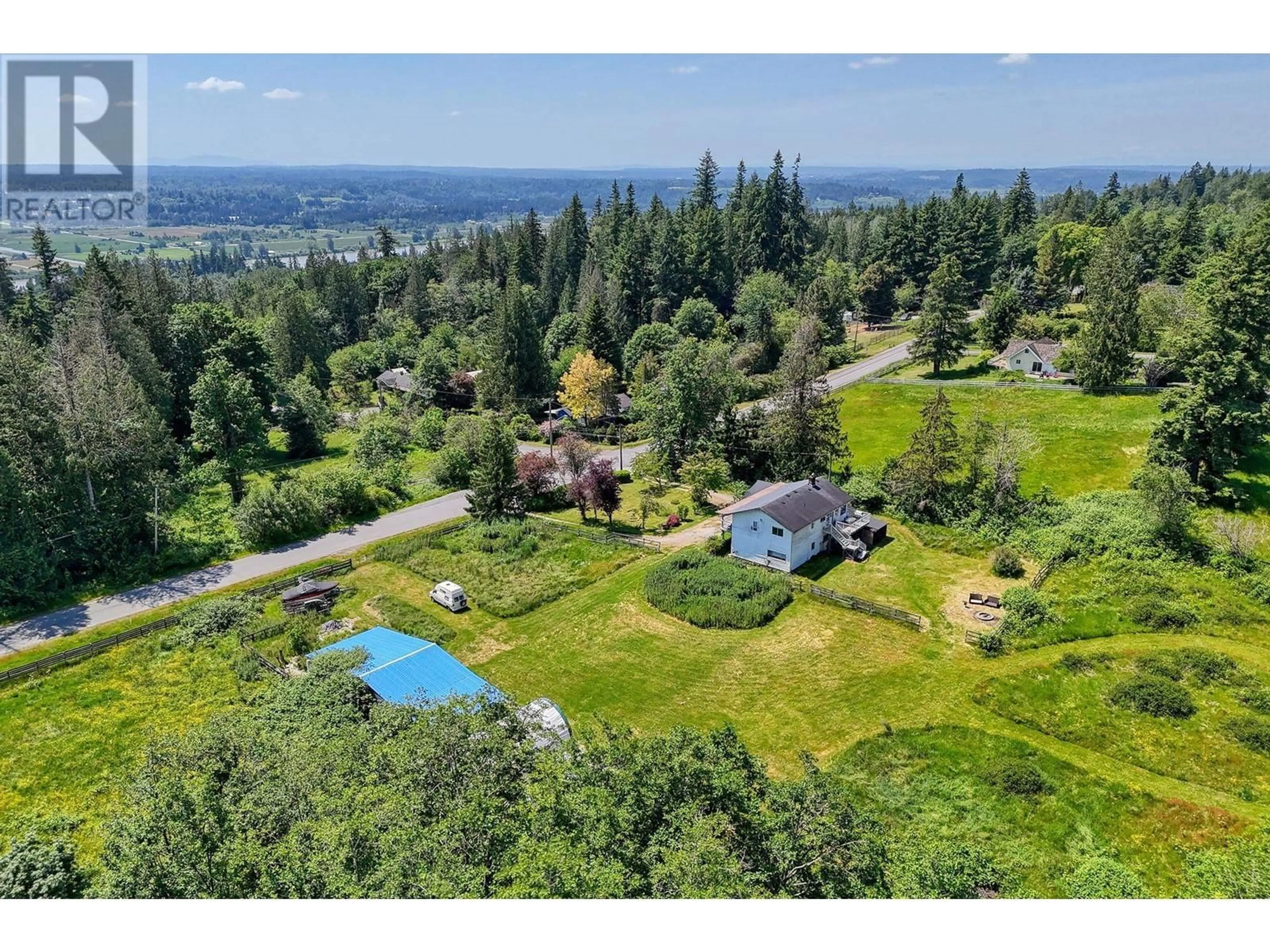 A pic from outside/outdoor area/front of a property/back of a property/a pic from drone, water/lake/river/ocean view for 10022 ROLLEY CRESCENT, Maple Ridge British Columbia V2W1J9