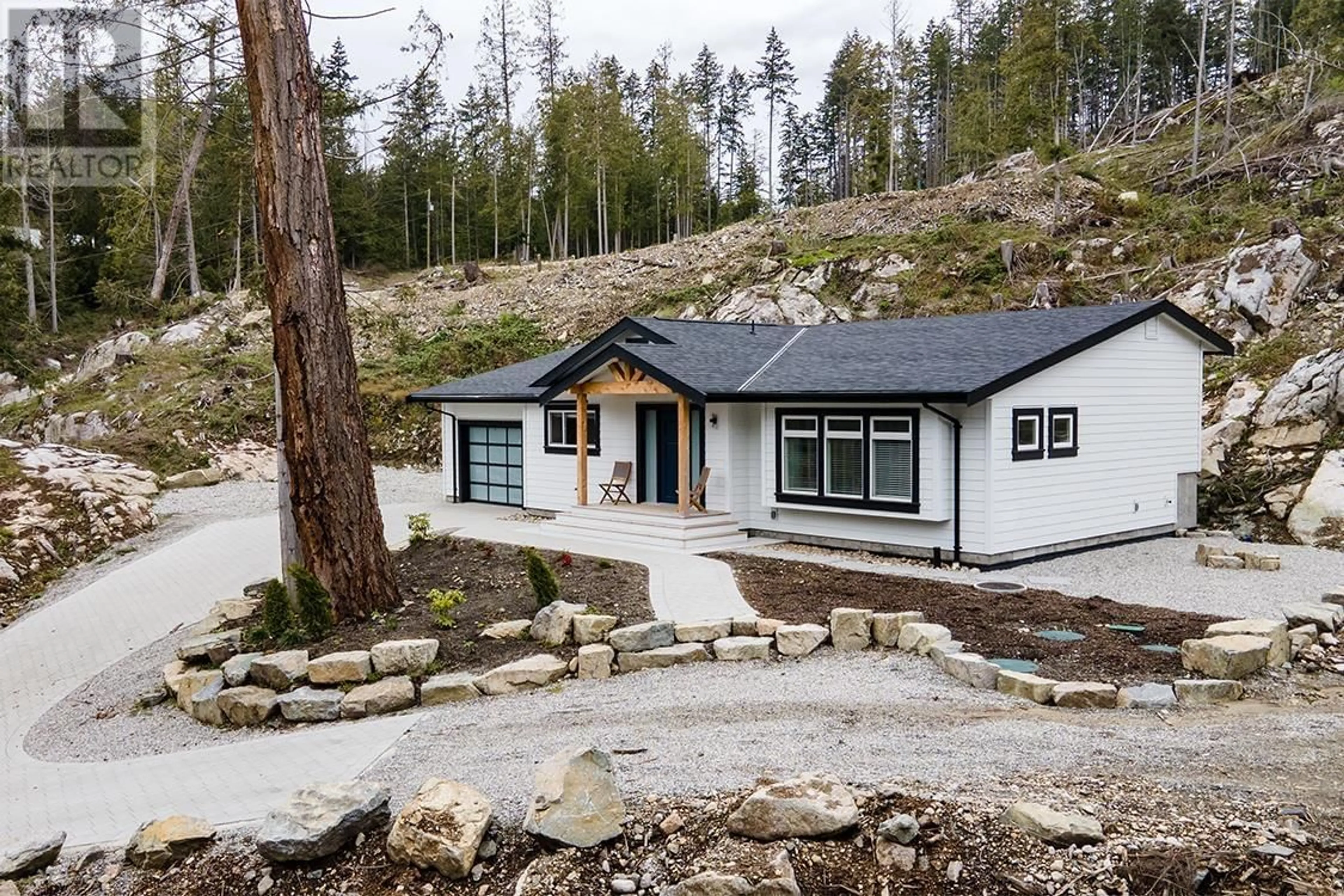 A pic from outside/outdoor area/front of a property/back of a property/a pic from drone, mountain view for 5758 SARGEANT BAY HEIGHTS ROAD, Halfmoon Bay British Columbia V7Z1C3