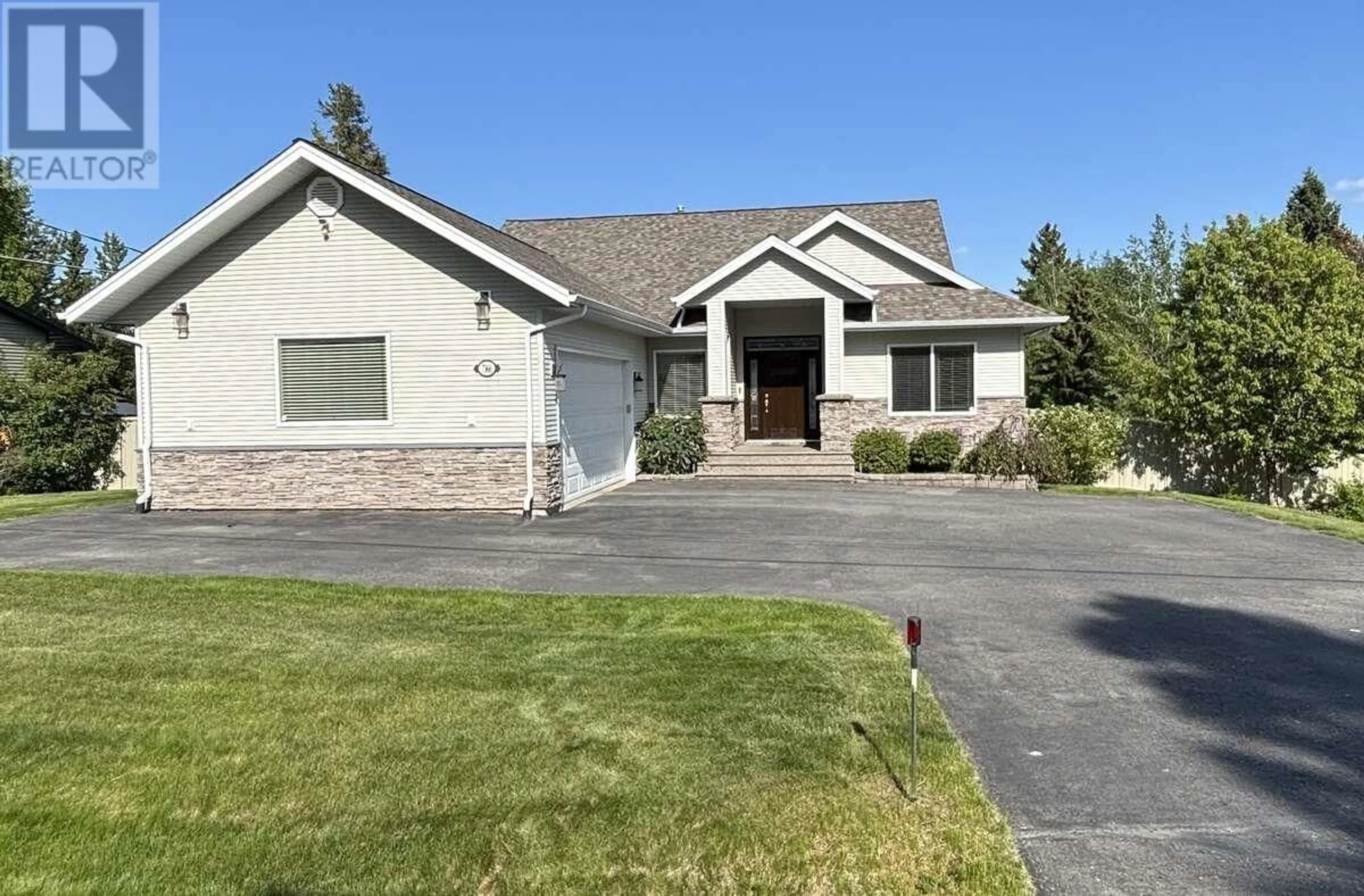Home with vinyl exterior material, street for 7366 EUGENE ROAD, Prince George British Columbia V2N5P6