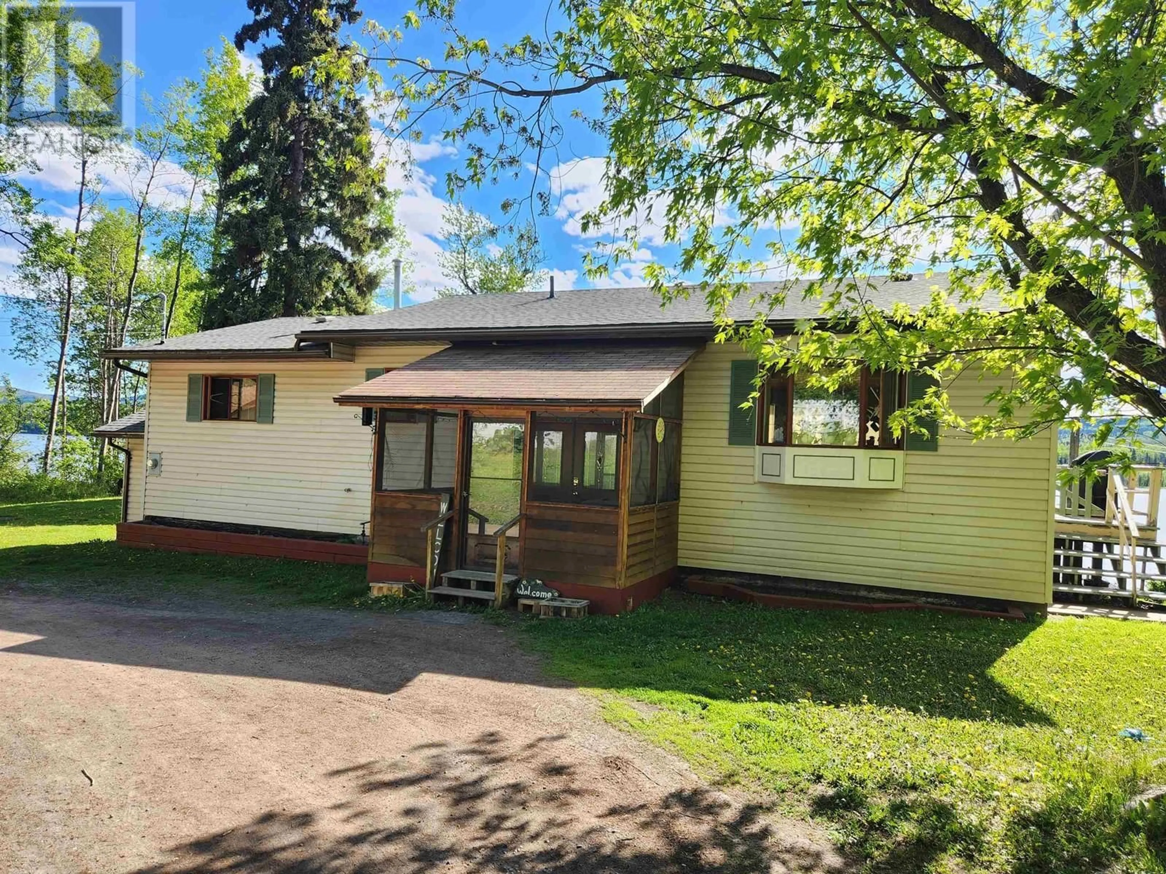 A pic from outside/outdoor area/front of a property/back of a property/a pic from drone, street for 8003 ROWLAND ROAD, Burns Lake British Columbia V0J1E1