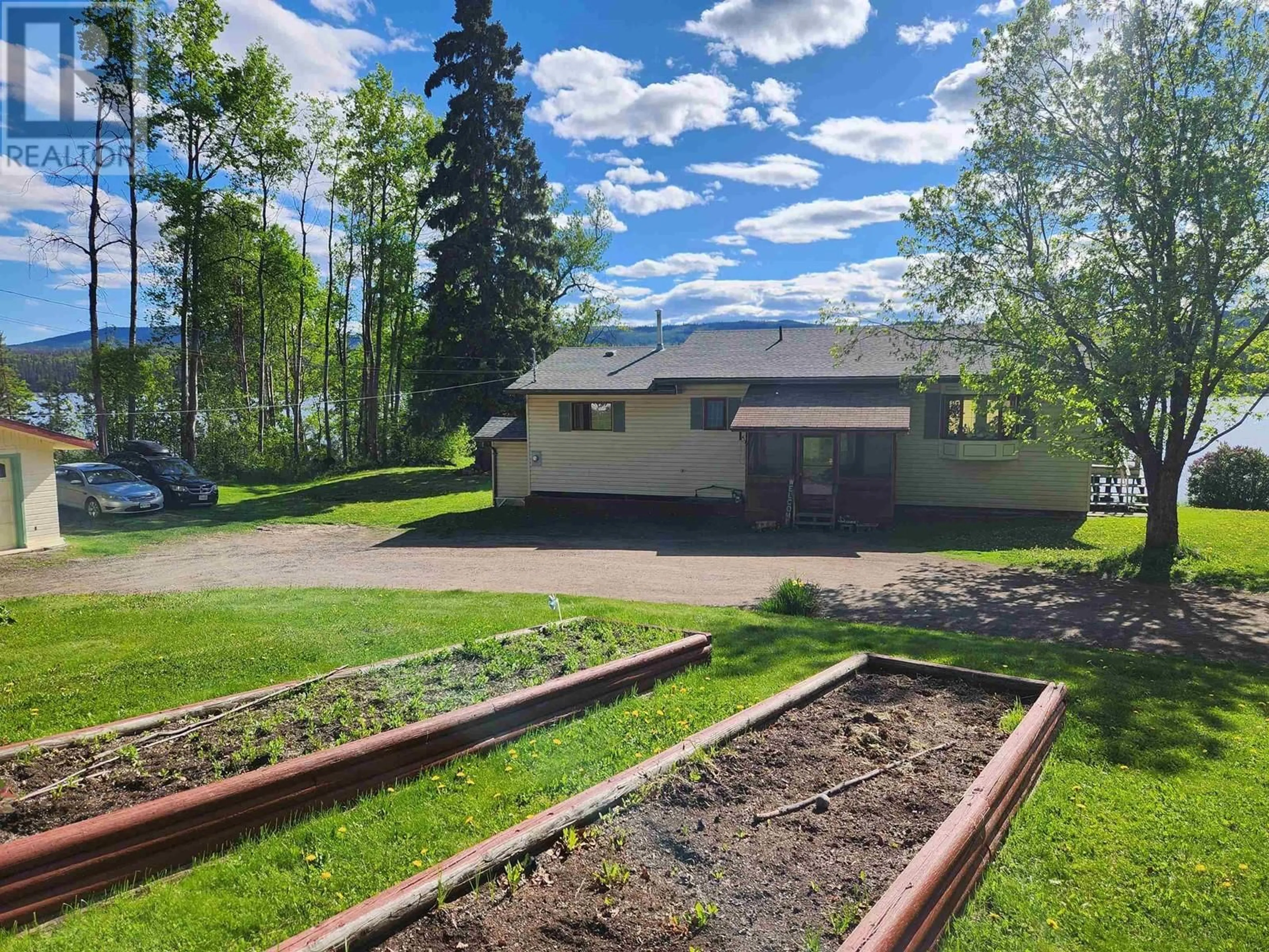 A pic from outside/outdoor area/front of a property/back of a property/a pic from drone, mountain view for 8003 ROWLAND ROAD, Burns Lake British Columbia V0J1E1