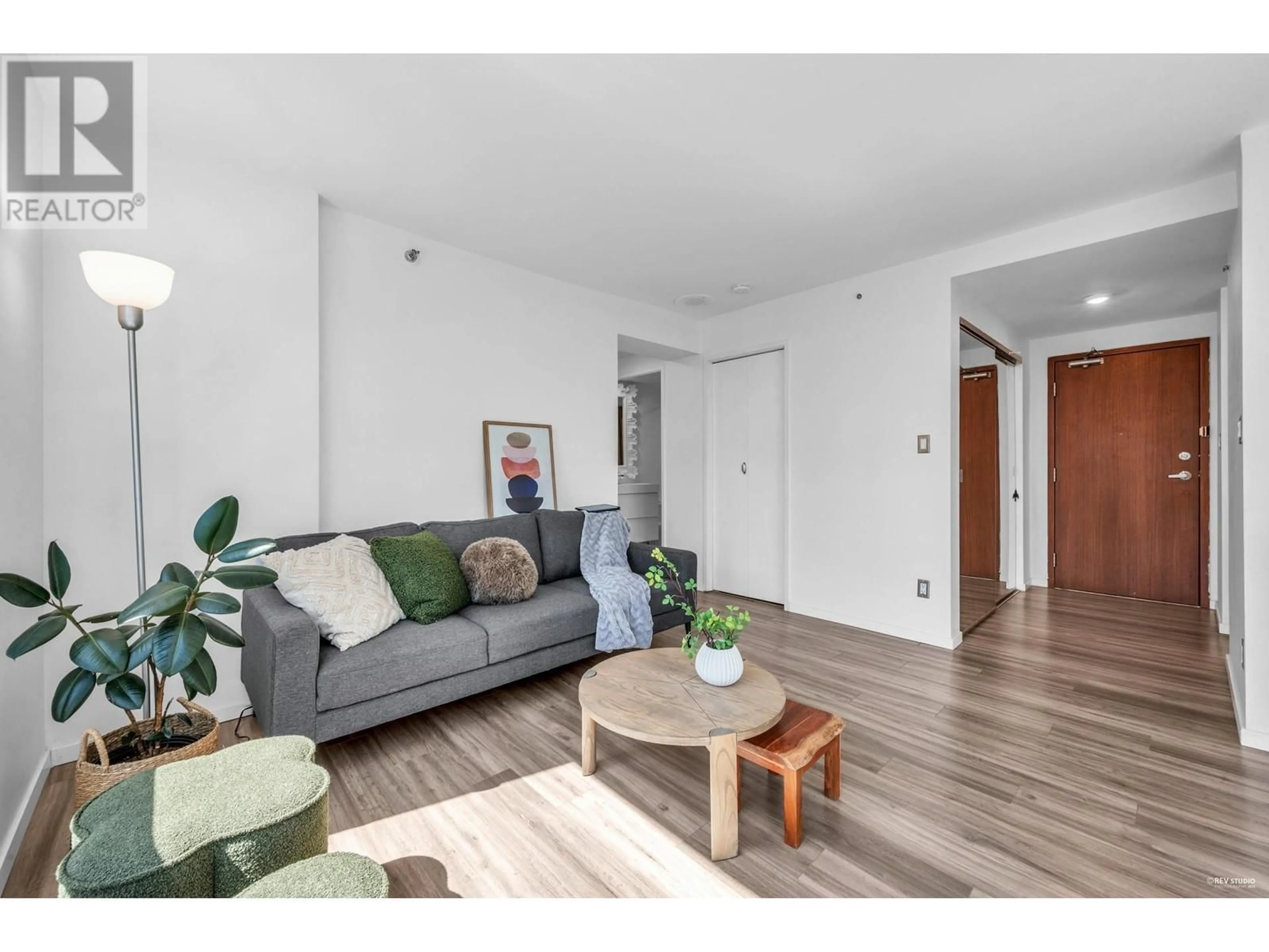 Living room with furniture, wood/laminate floor for 1304 - 555 JERVIS STREET, Vancouver British Columbia V6E4N1