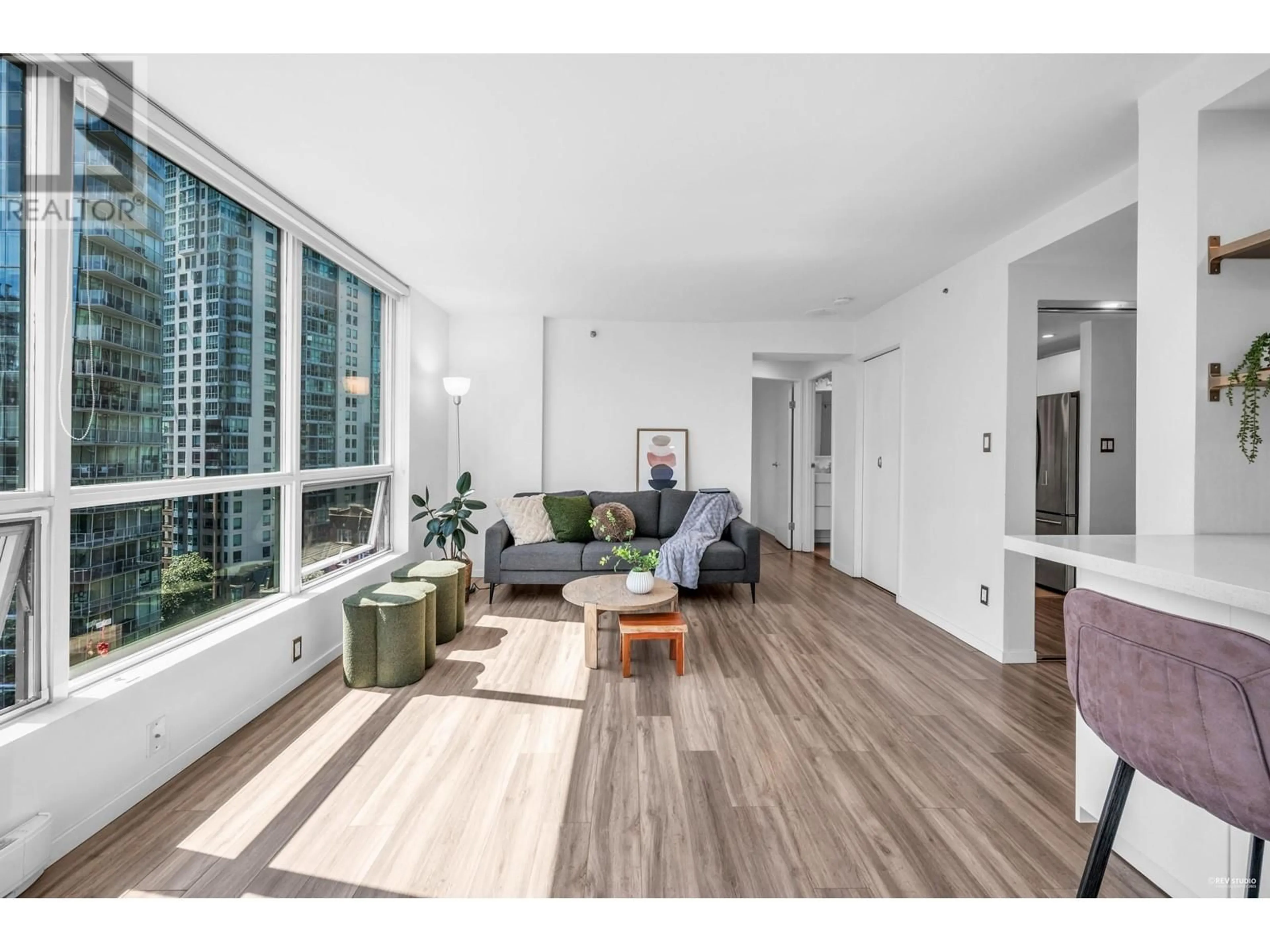 Living room with furniture, wood/laminate floor for 1304 - 555 JERVIS STREET, Vancouver British Columbia V6E4N1