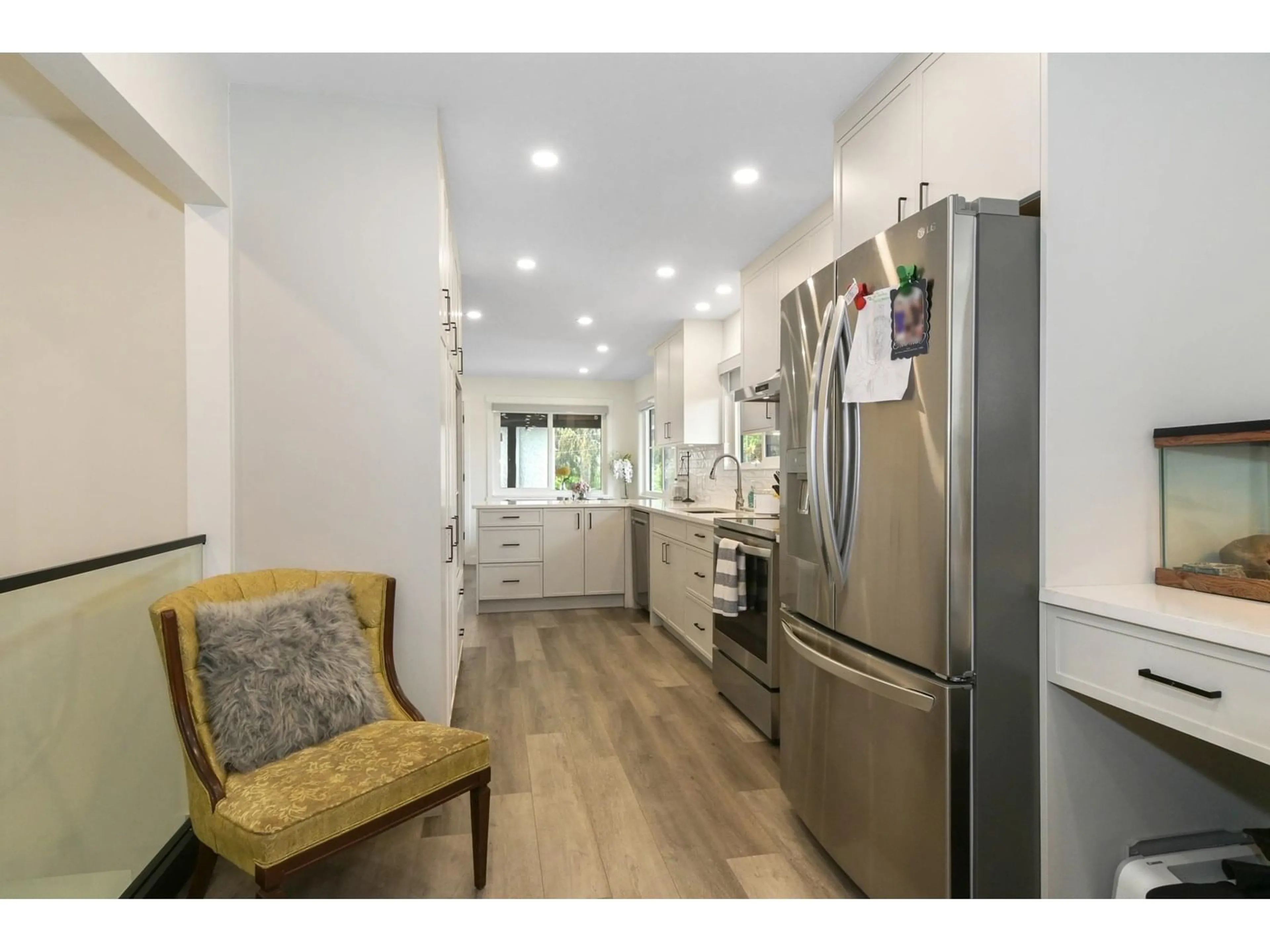 Open concept kitchen, ceramic/tile floor for 11852 85A, Delta British Columbia V4C2V6