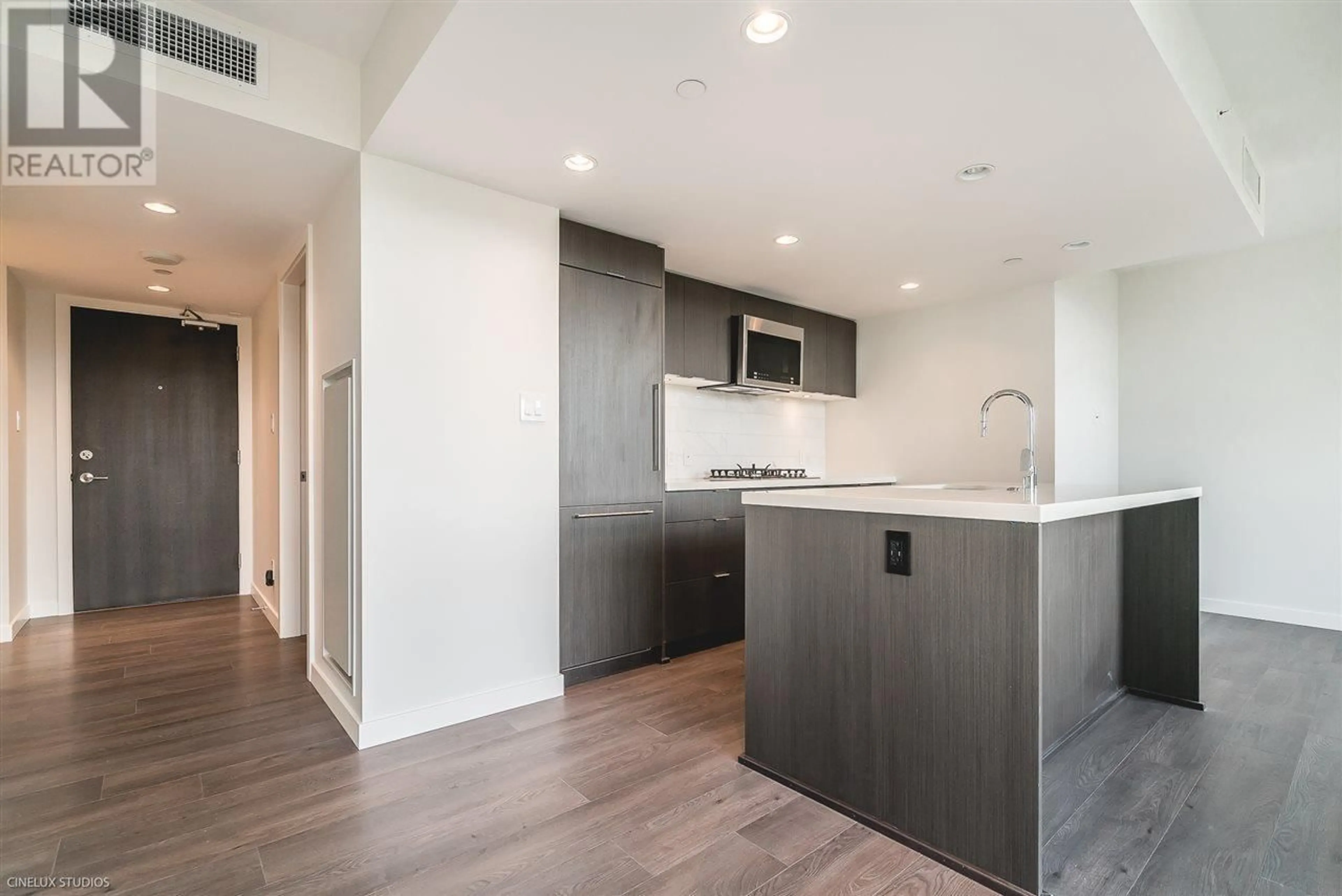 Open concept kitchen, wood/laminate floor for 904 - 8189 CAMBIE STREET, Vancouver British Columbia V6P0G6
