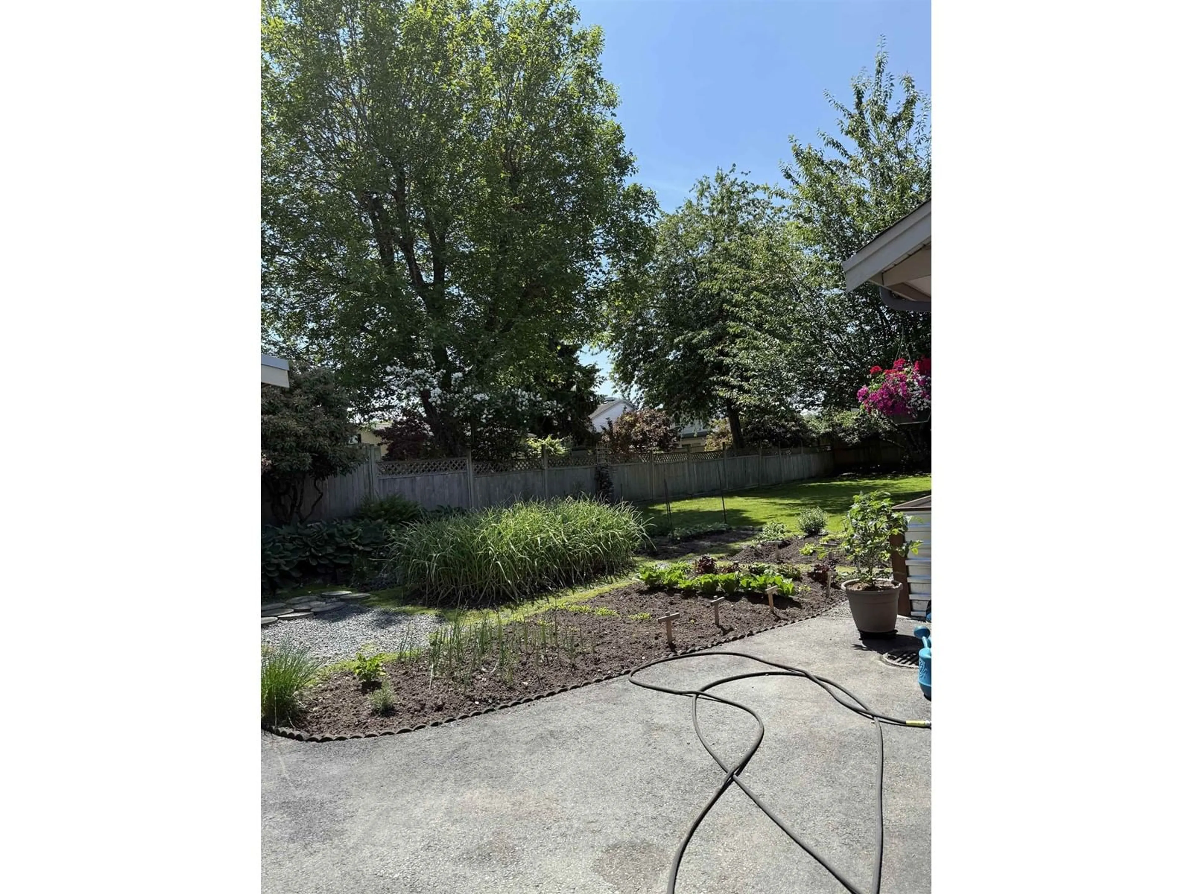 A pic from outside/outdoor area/front of a property/back of a property/a pic from drone, street for 9613 HAZEL STREET, Chilliwack British Columbia V2P5N8