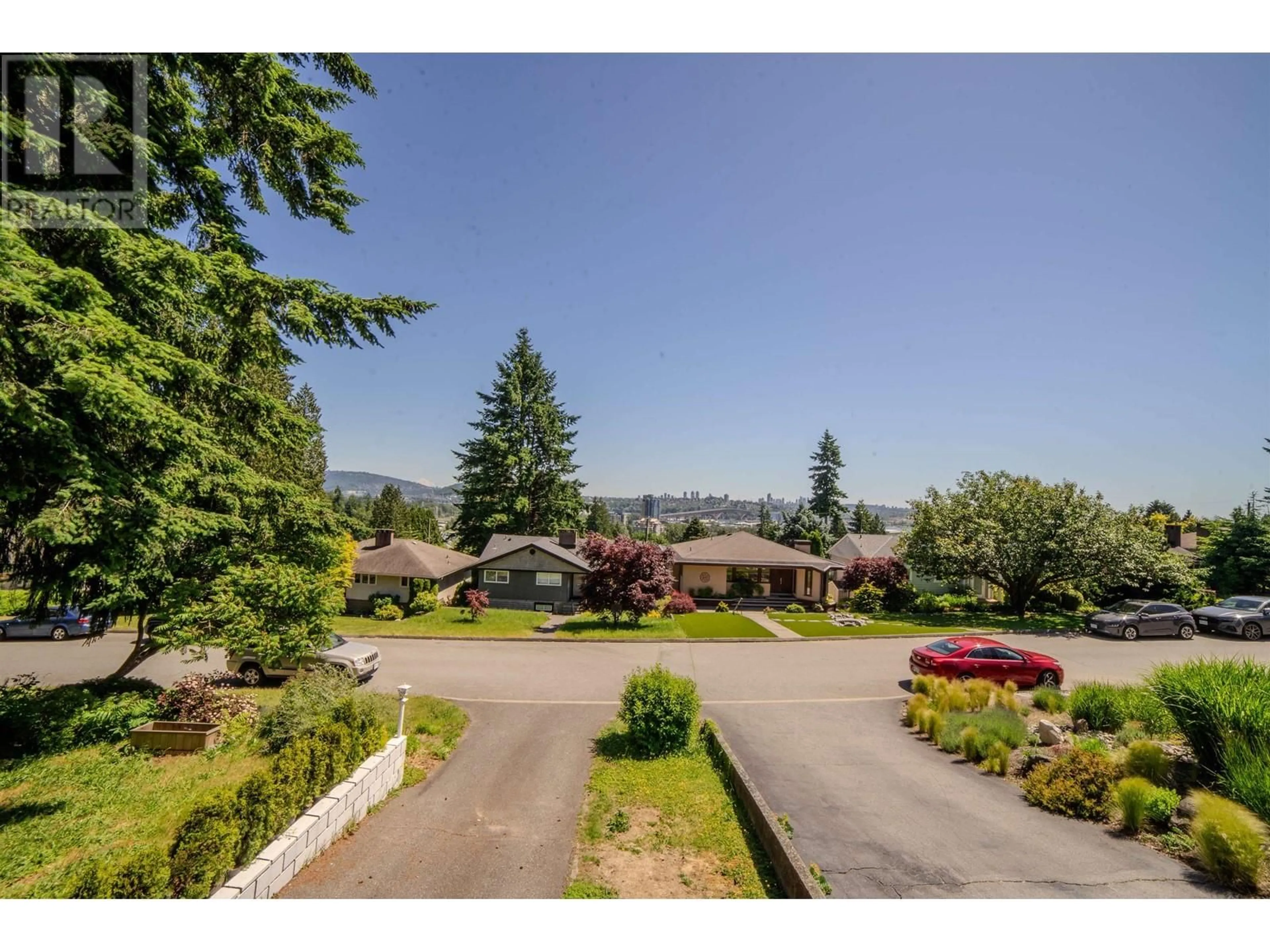 A pic from outside/outdoor area/front of a property/back of a property/a pic from drone, mountain view for 1082 CALVERHALL STREET, North Vancouver British Columbia V7L1Y3