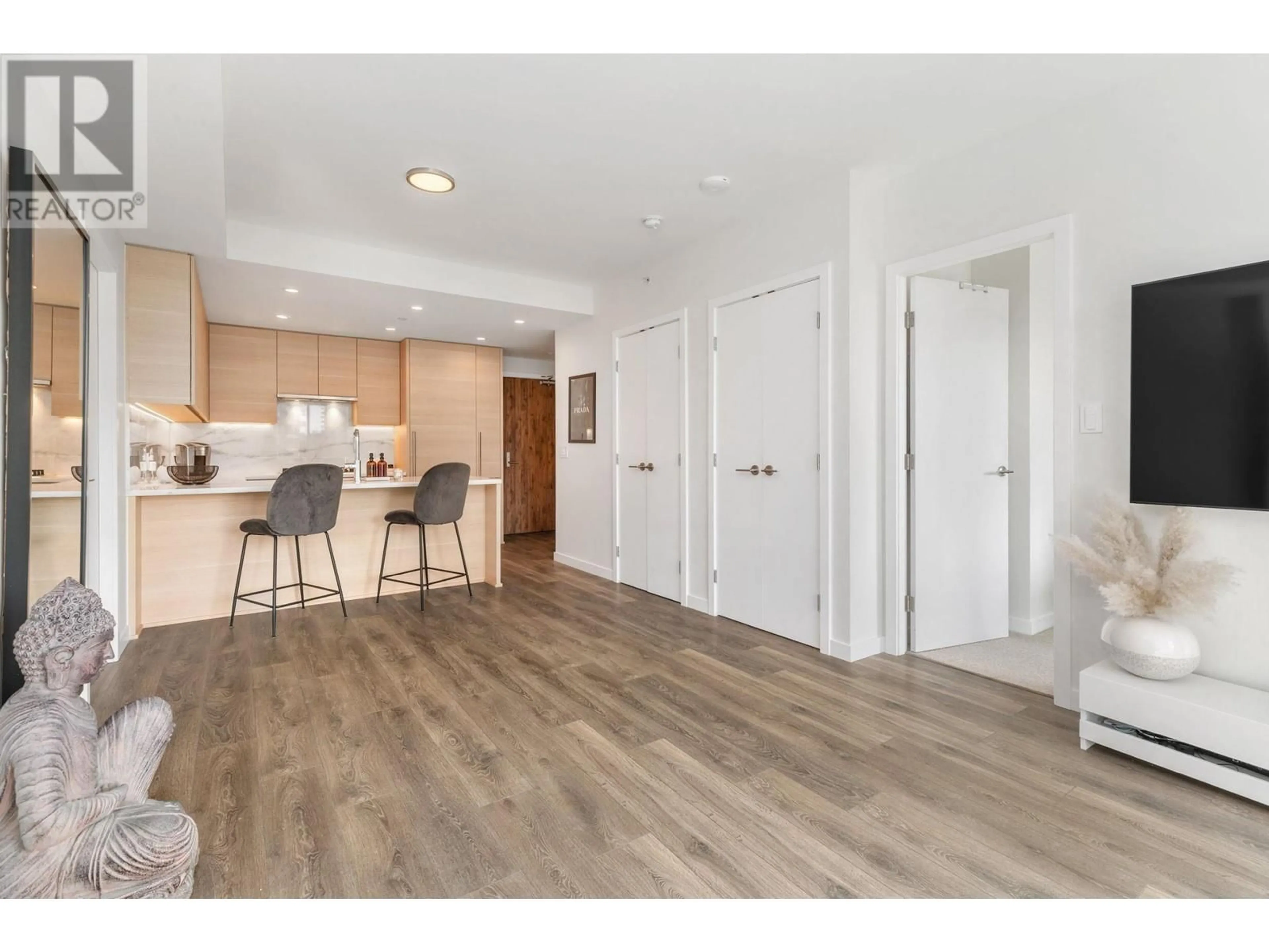 Open concept kitchen, wood/laminate floor for 1008 - 308 MORRISSEY ROAD, Port Moody British Columbia V3H0M2