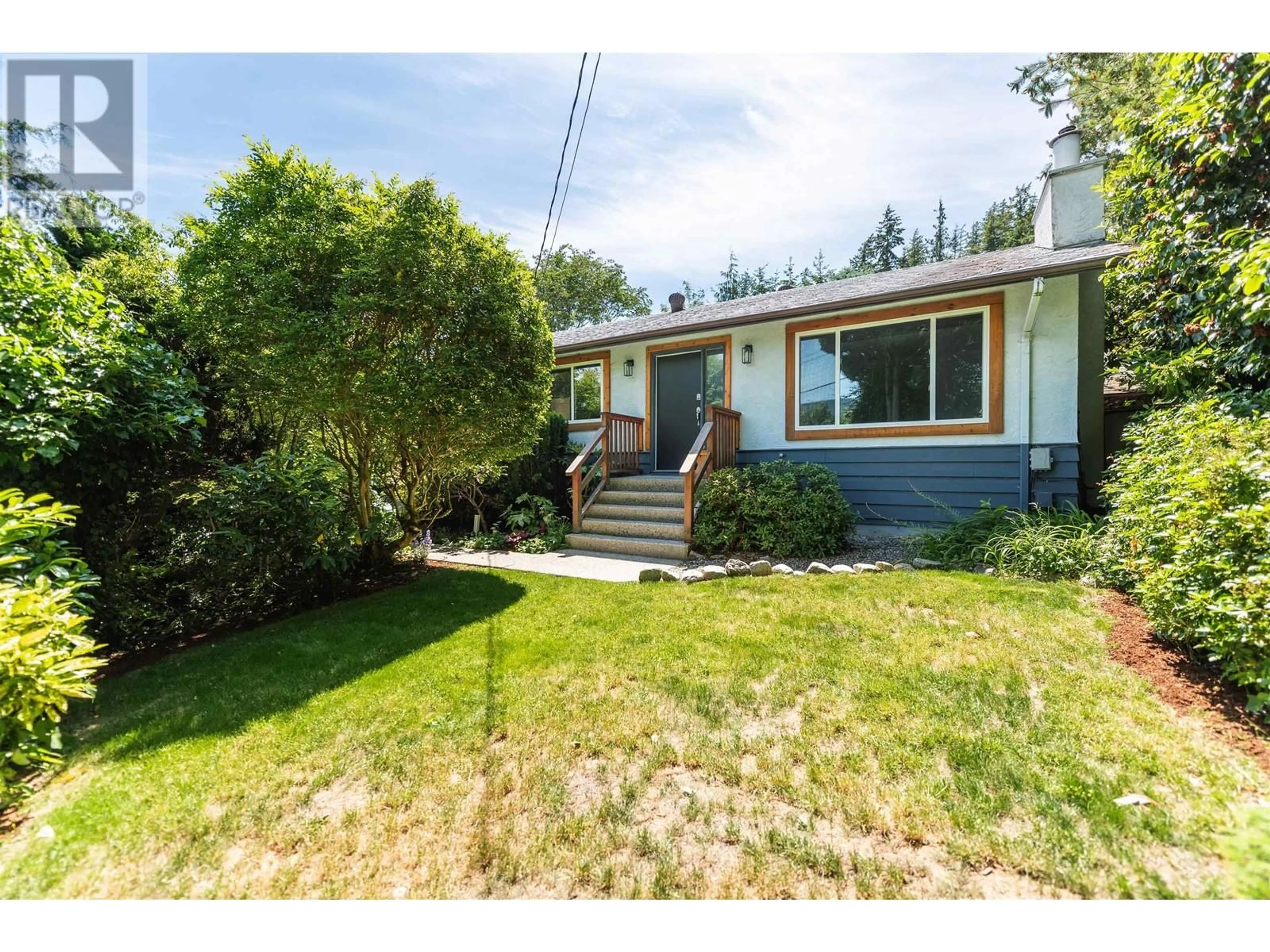 A pic from outside/outdoor area/front of a property/back of a property/a pic from drone, street for 5711 TRAIL AVENUE, Sechelt British Columbia V0N3A0
