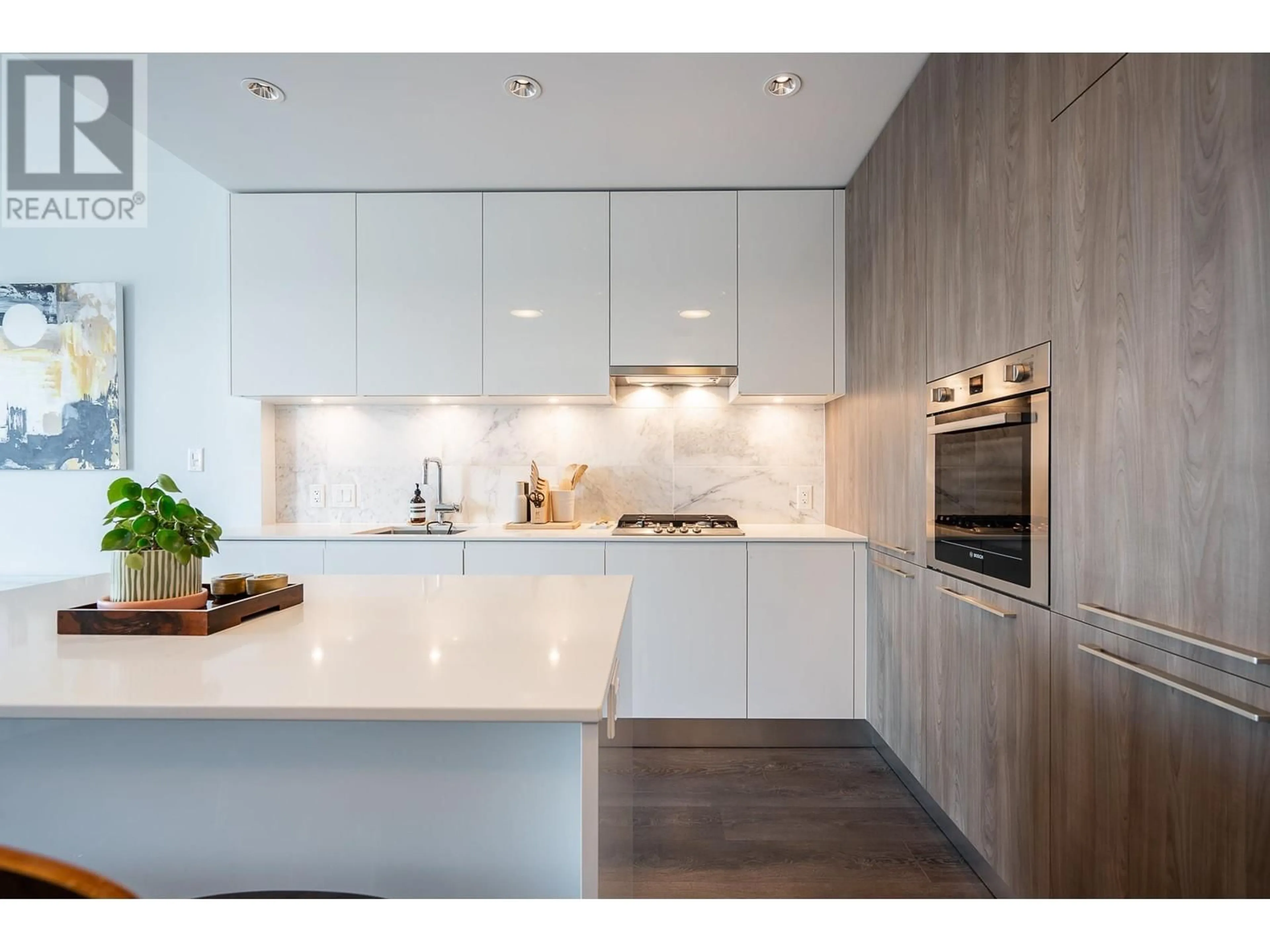 Contemporary kitchen, wood/laminate floor for 1505 - 1955 ALPHA WAY, Burnaby British Columbia V5C0K6