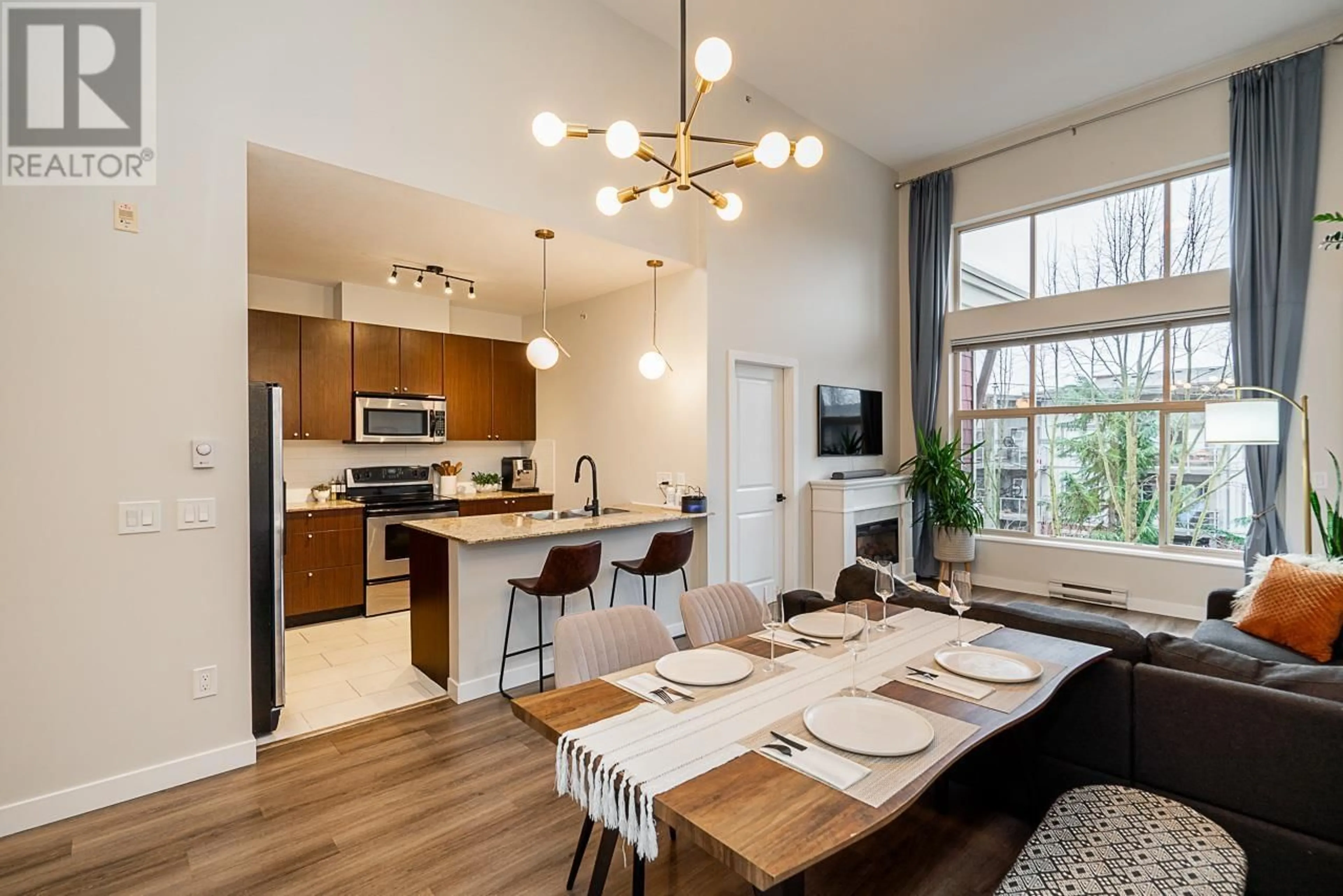 Open concept kitchen, wood/laminate floor for 420 - 2477 KELLY AVENUE, Port Coquitlam British Columbia V3C0B3