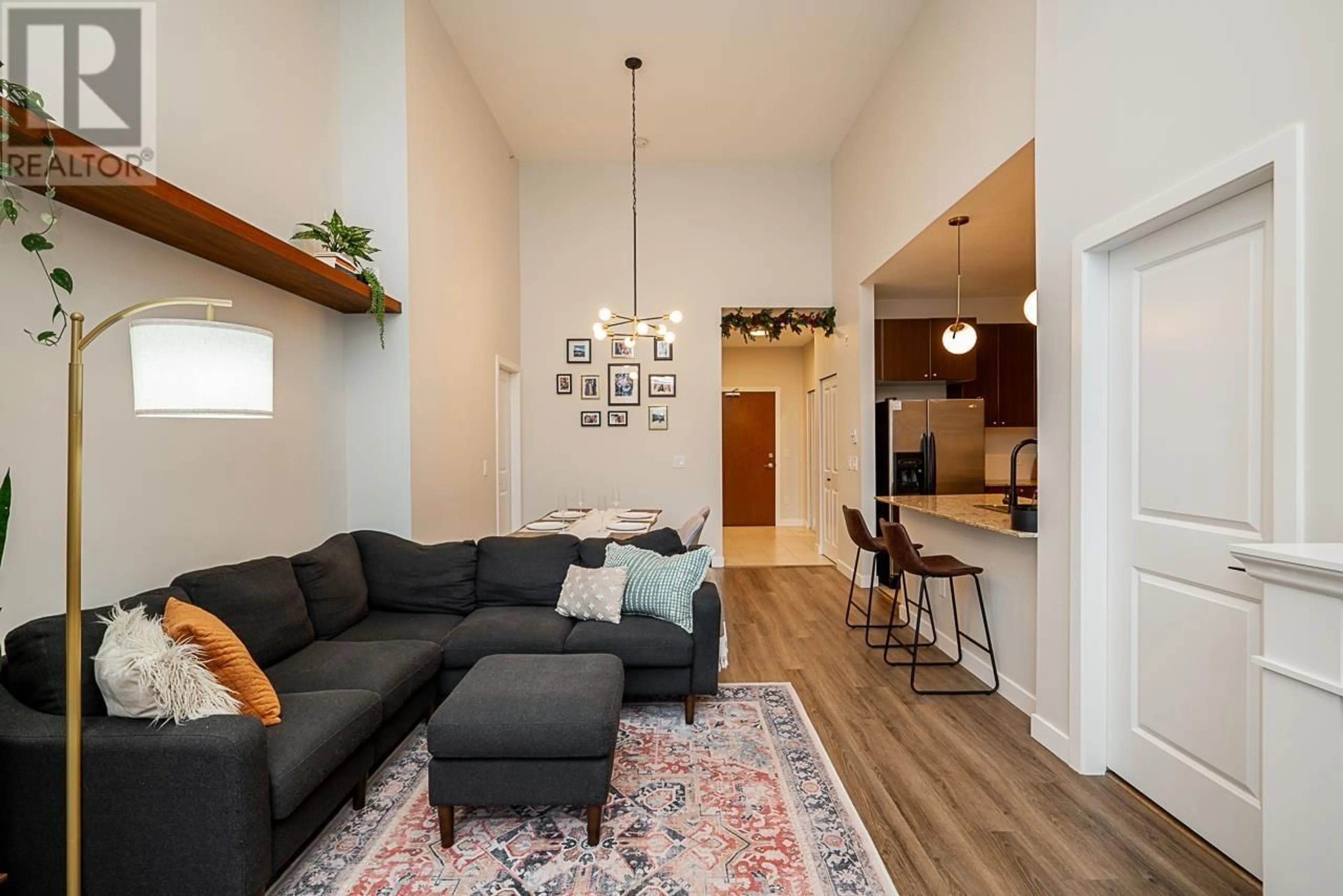 Living room with furniture, wood/laminate floor for 420 - 2477 KELLY AVENUE, Port Coquitlam British Columbia V3C0B3