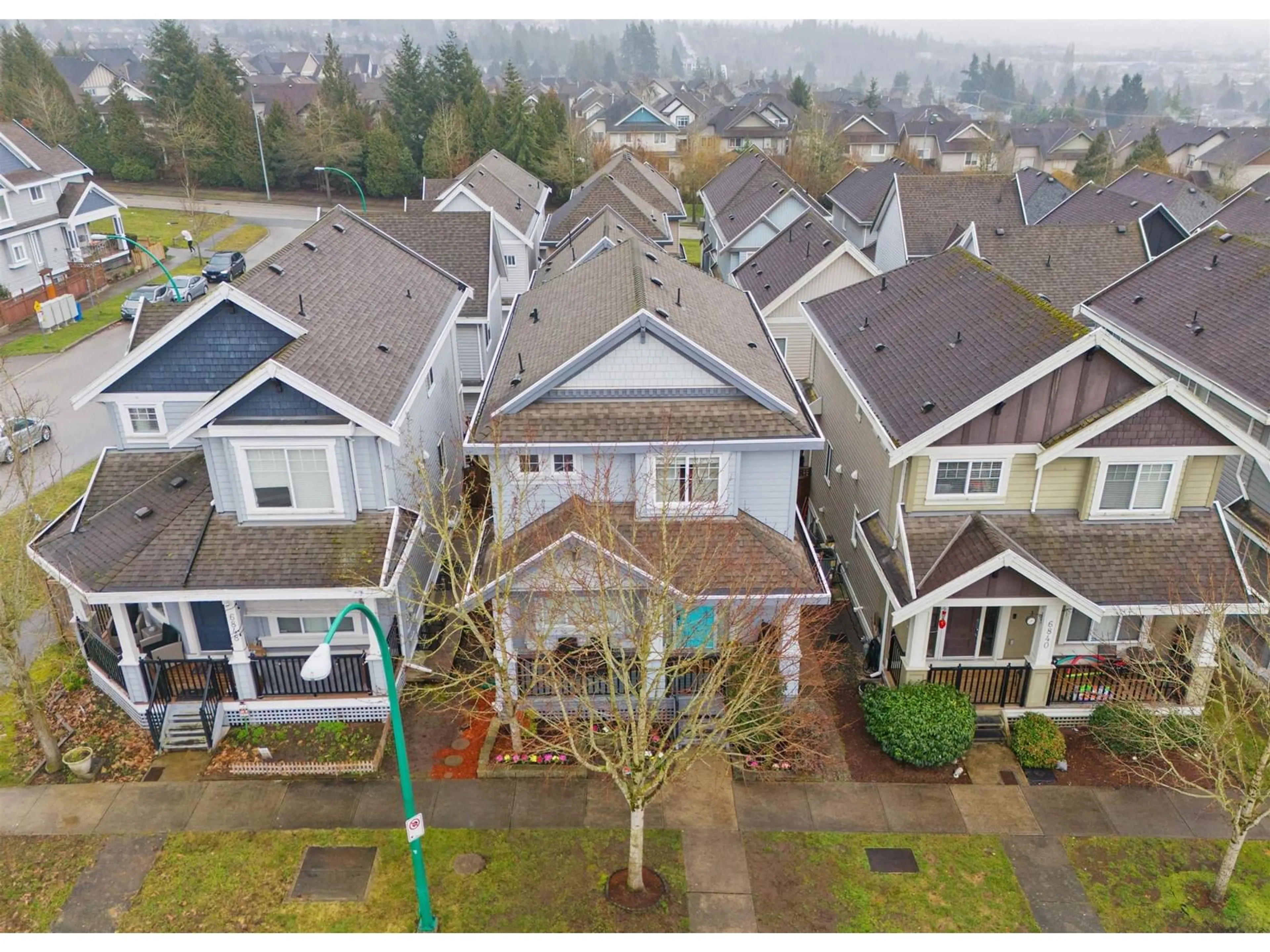 A pic from outside/outdoor area/front of a property/back of a property/a pic from drone, unknown for 6844 195A, Surrey British Columbia V4N5Z7