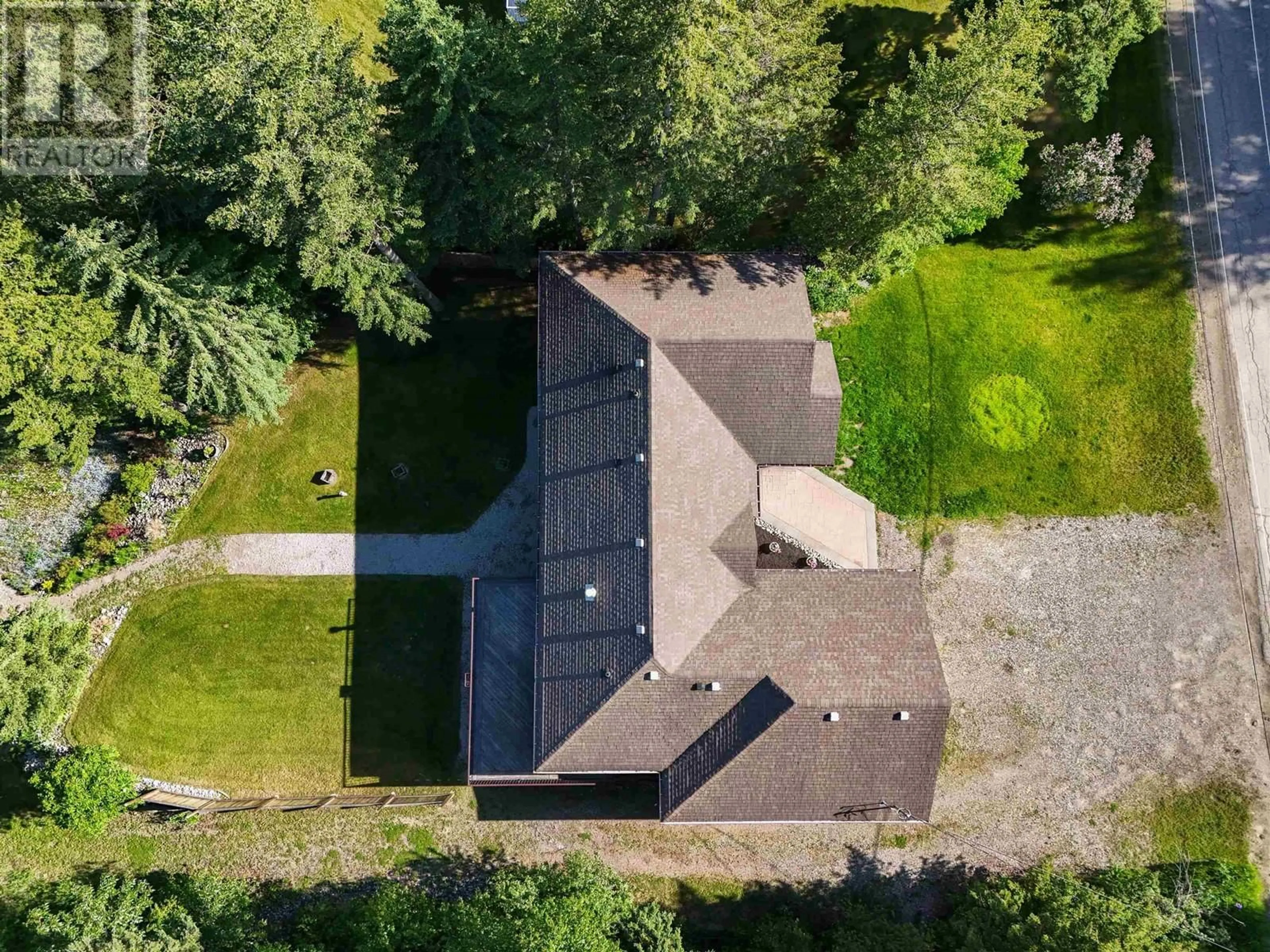 A pic from outside/outdoor area/front of a property/back of a property/a pic from drone, street for 556 DENNIS ROAD, Quesnel British Columbia V2J5W7