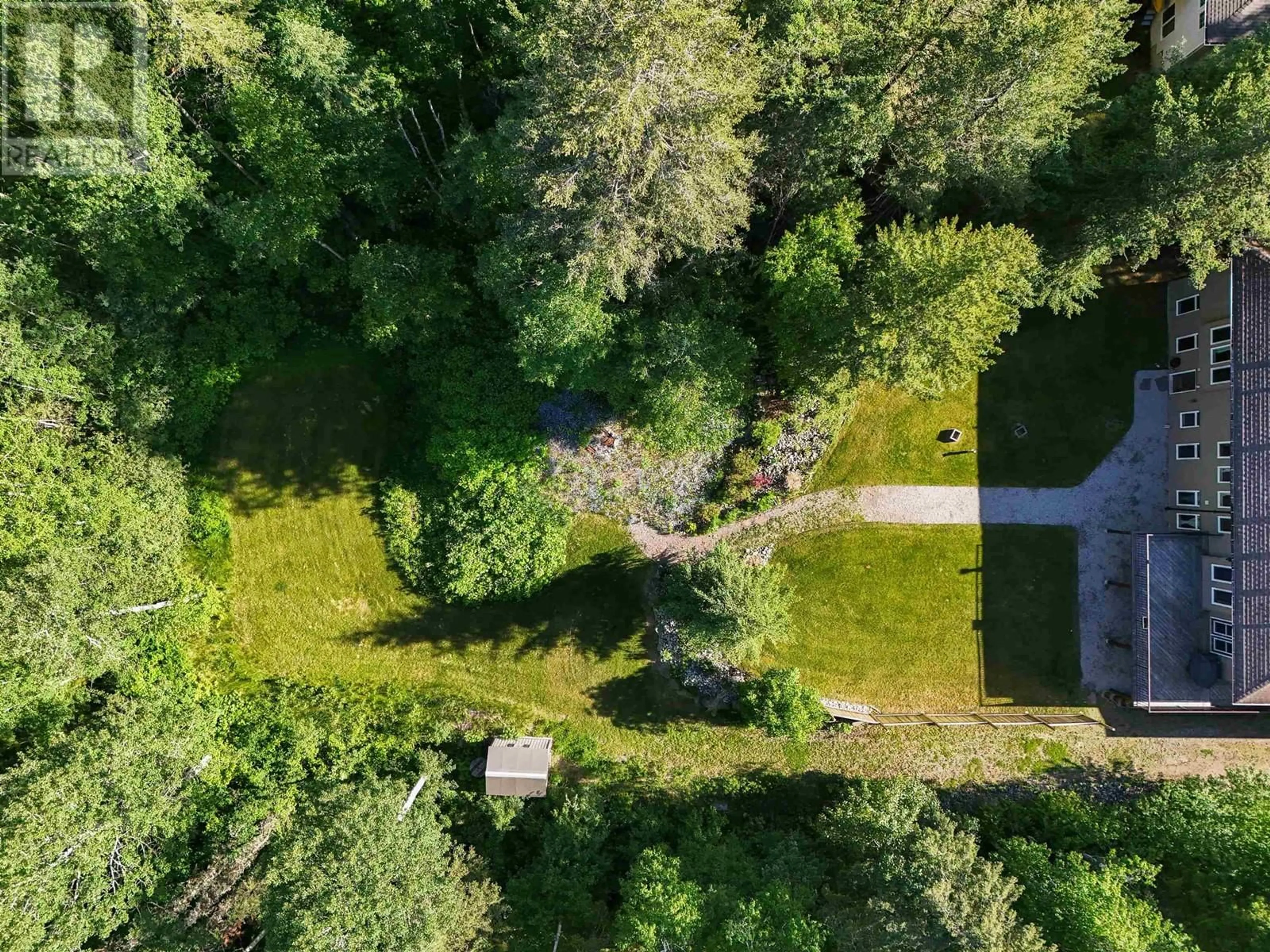 A pic from outside/outdoor area/front of a property/back of a property/a pic from drone, forest/trees view for 556 DENNIS ROAD, Quesnel British Columbia V2J5W7