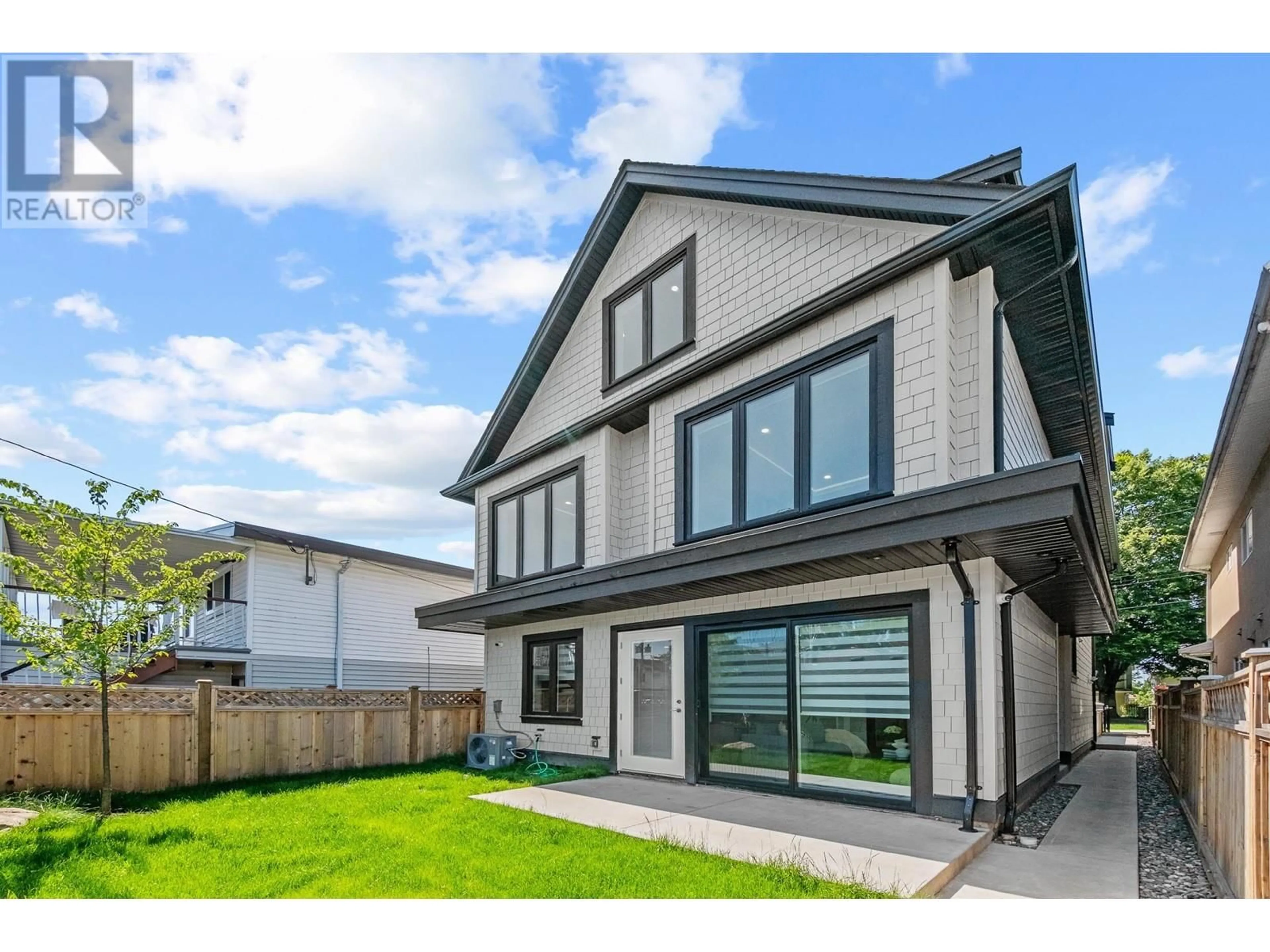 Home with vinyl exterior material, street for 2 - 4650 GOTHARD STREET, Vancouver British Columbia V5R3K7