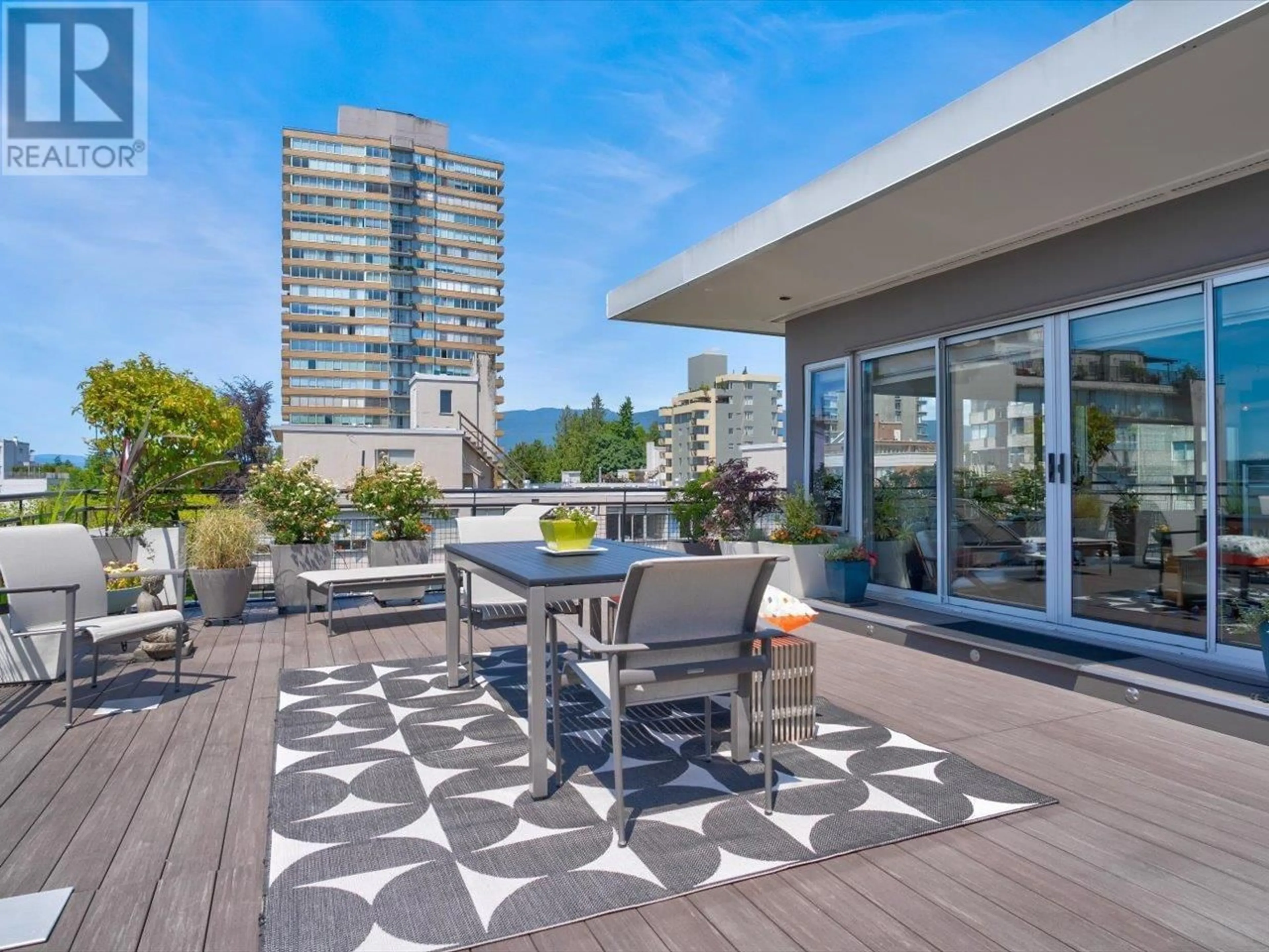 Patio, city buildings view from balcony for 601 - 1975 PENDRELL STREET, Vancouver British Columbia V6G1T6