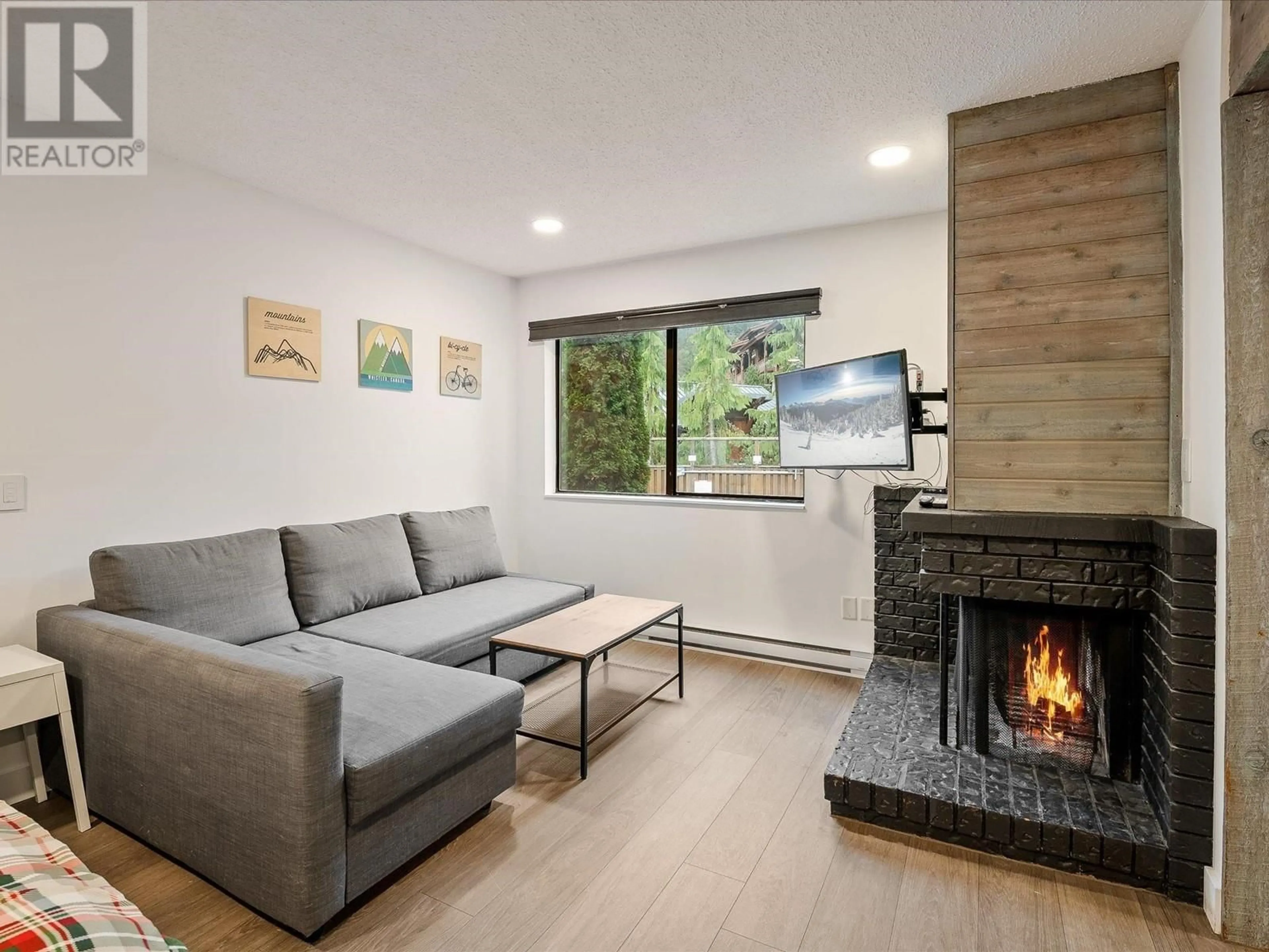 Living room with furniture, unknown for 104 - 2129 LAKE PLACID ROAD, Whistler British Columbia V8E0N4
