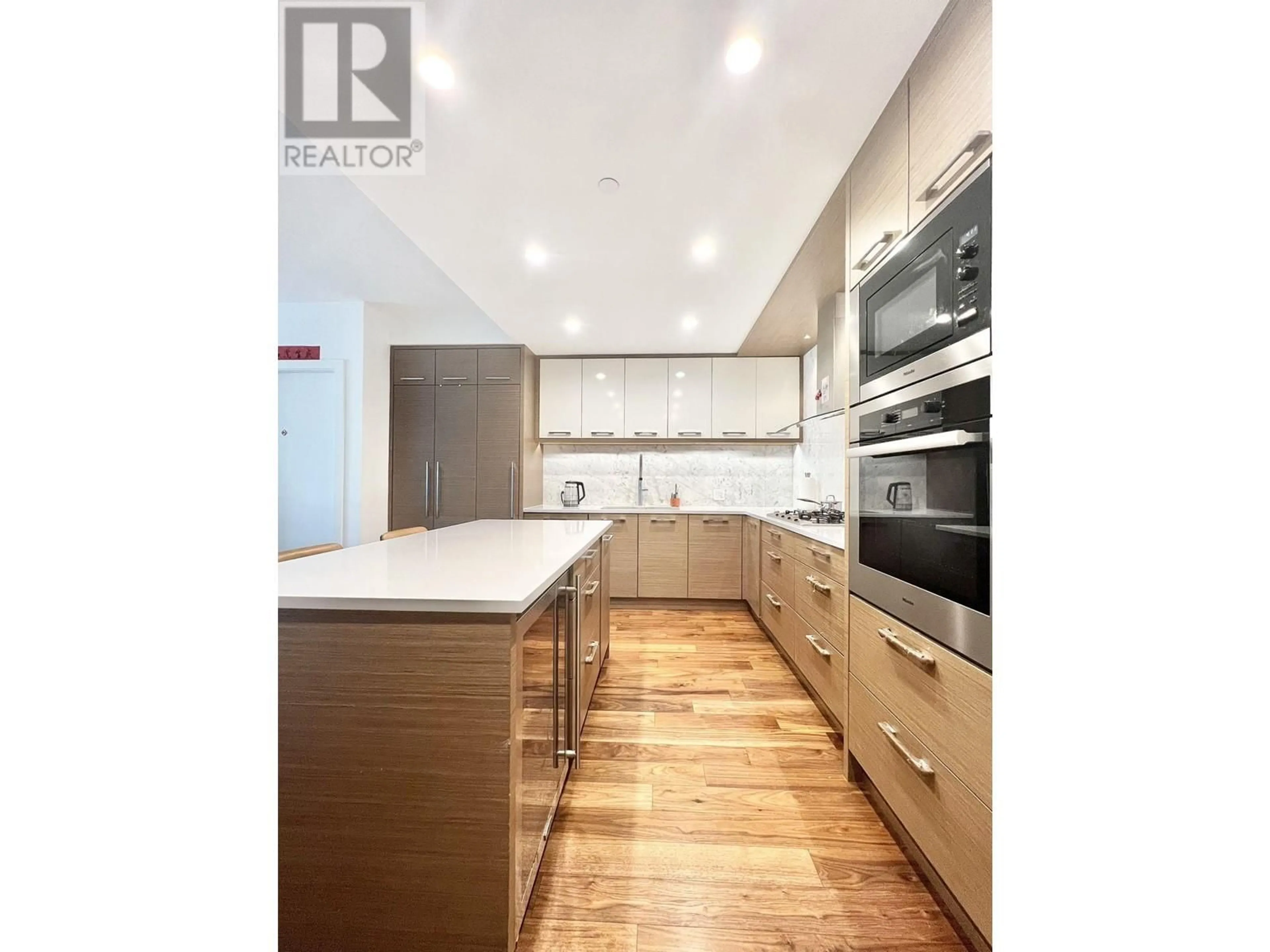 Contemporary kitchen, wood/laminate floor for 1003 - 4360 BERESFORD STREET, Burnaby British Columbia V5H0G2