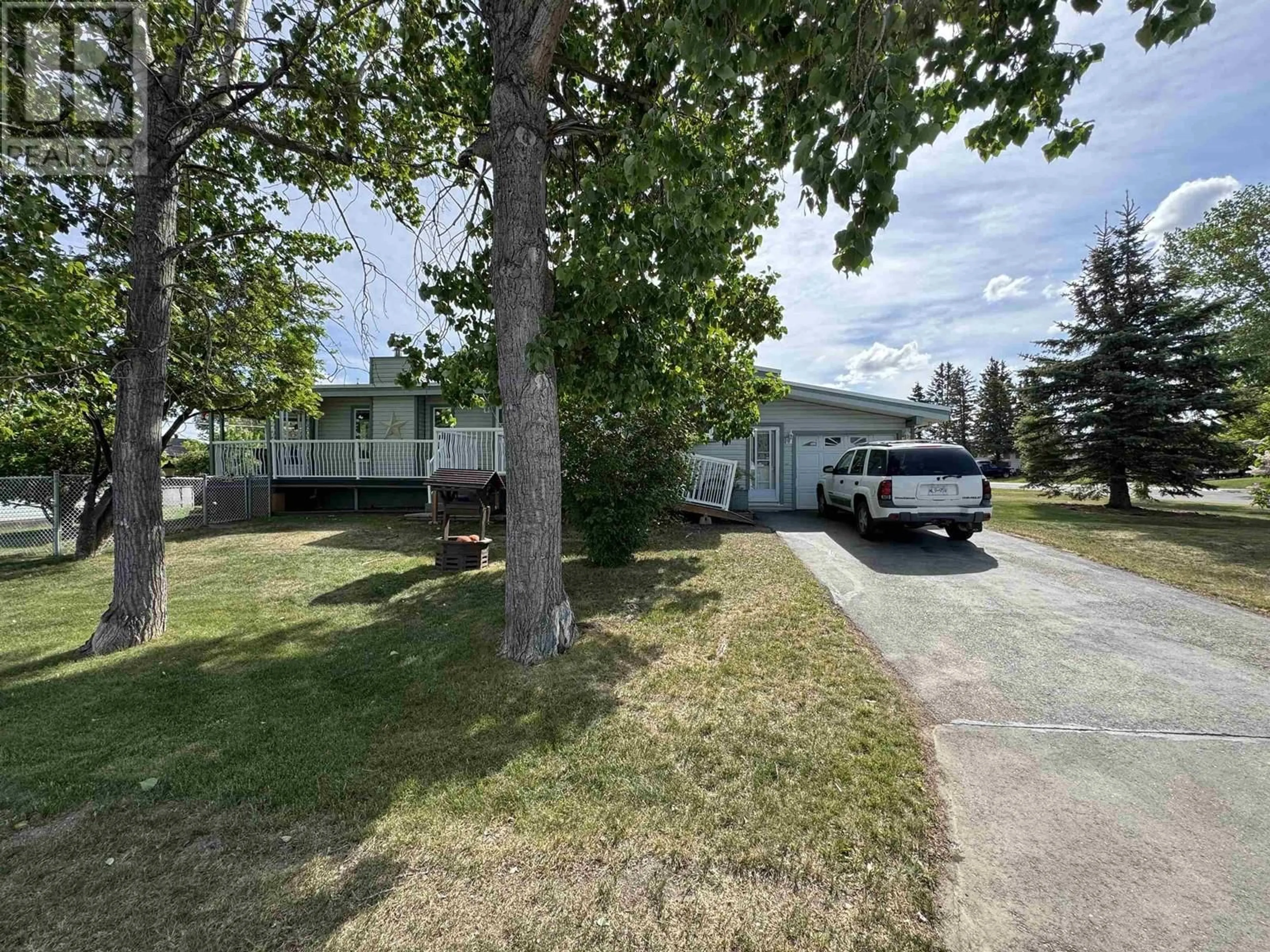 A pic from outside/outdoor area/front of a property/back of a property/a pic from drone, street for 10320 111 AVENUE, Fort St. John British Columbia V1J2V4