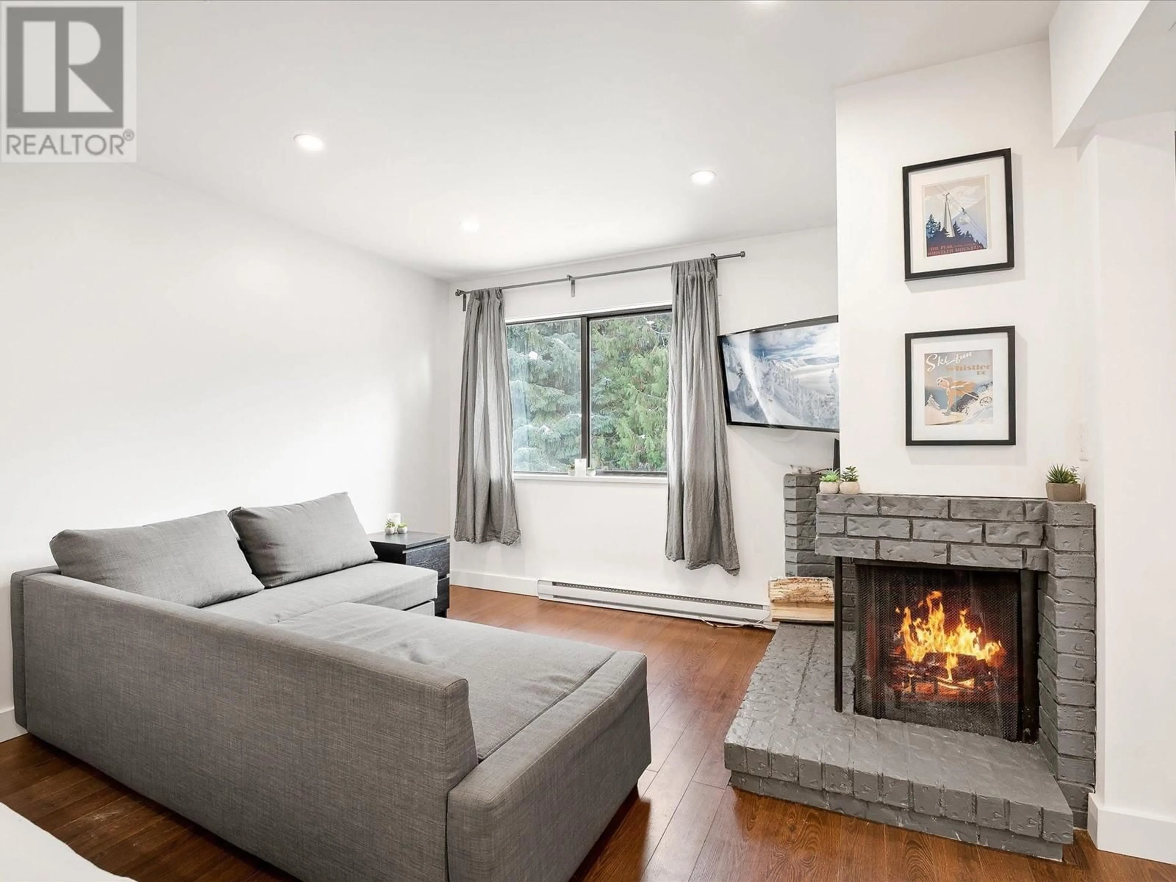 Living room with furniture, unknown for 301 - 2129 LAKE PLACID ROAD, Whistler British Columbia V8E0N4