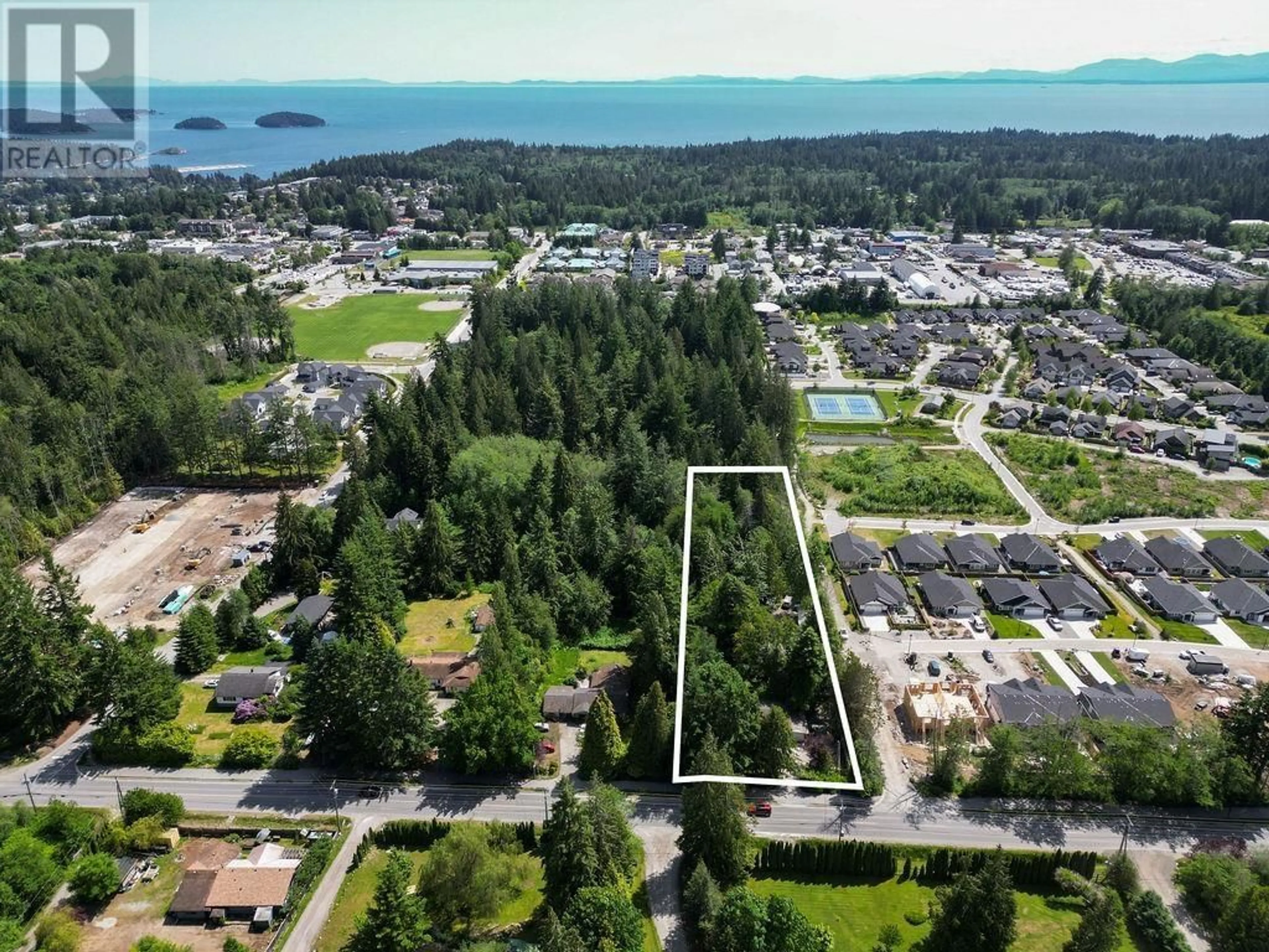 A pic from outside/outdoor area/front of a property/back of a property/a pic from drone, water/lake/river/ocean view for 1009 REED ROAD, Gibsons British Columbia V0N1V7