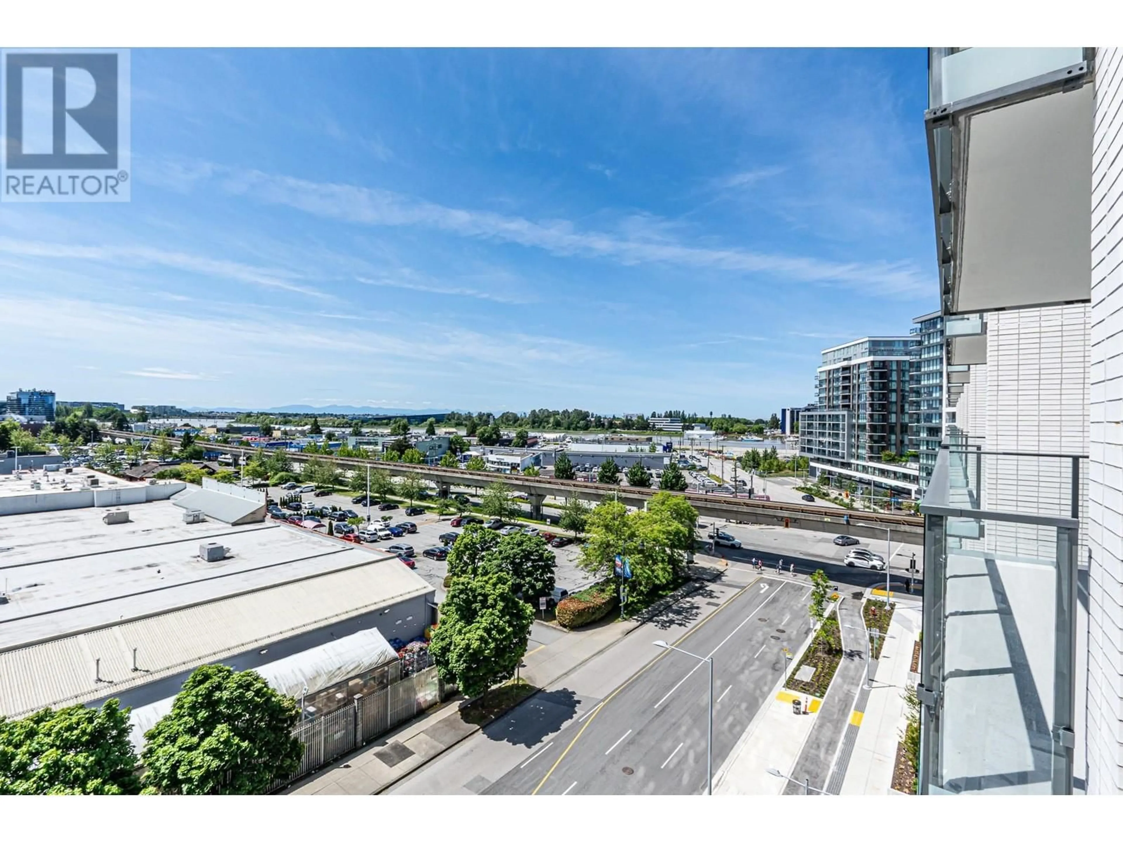 A pic from outside/outdoor area/front of a property/back of a property/a pic from drone, city buildings view from balcony for 701 - 8611 HAZELBRIDGE WAY, Richmond British Columbia V6X0W8