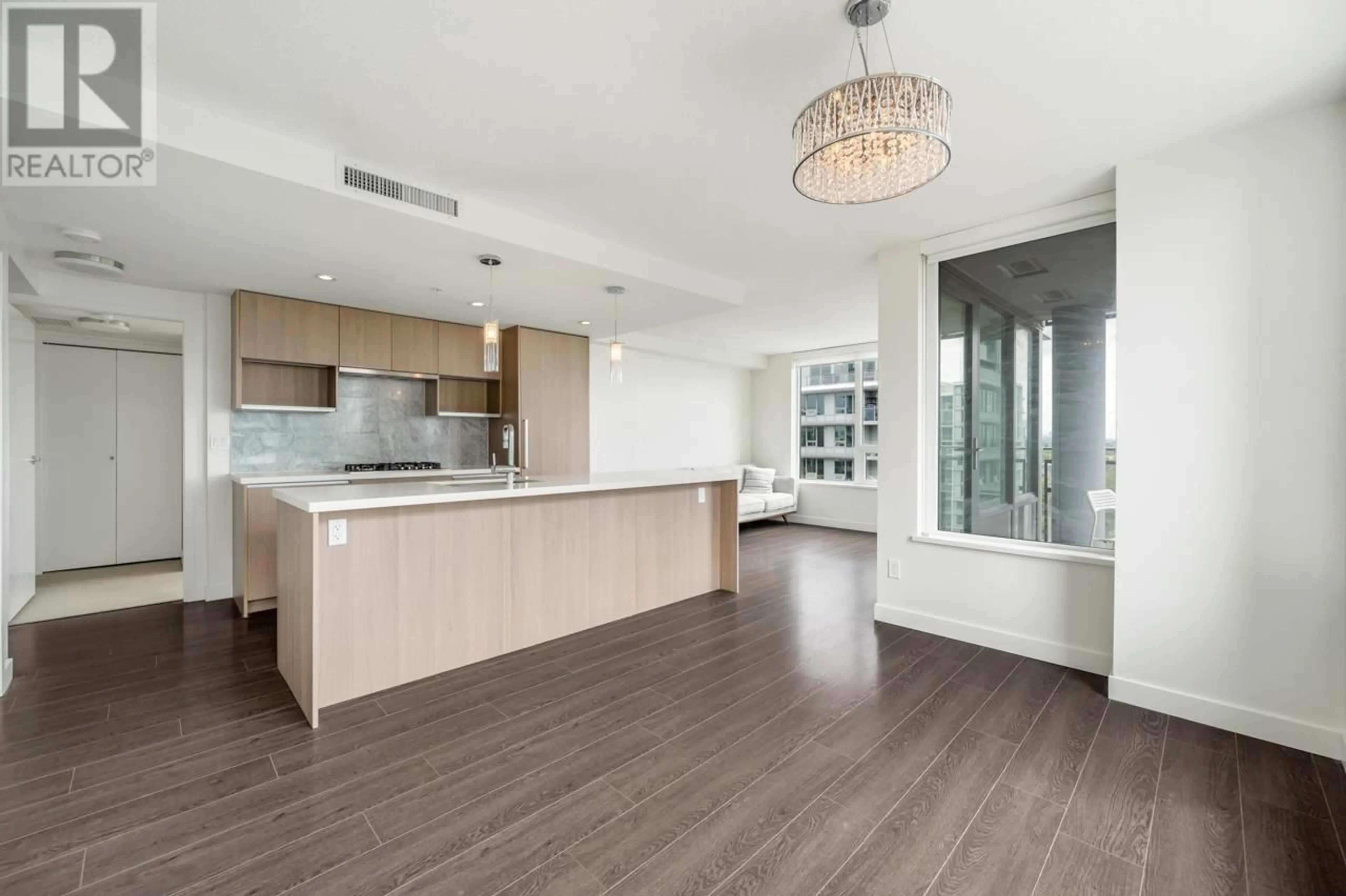 Open concept kitchen, wood/laminate floor for 1601 - 8833 HAZELBRIDGE WAY, Richmond British Columbia V6X0N3